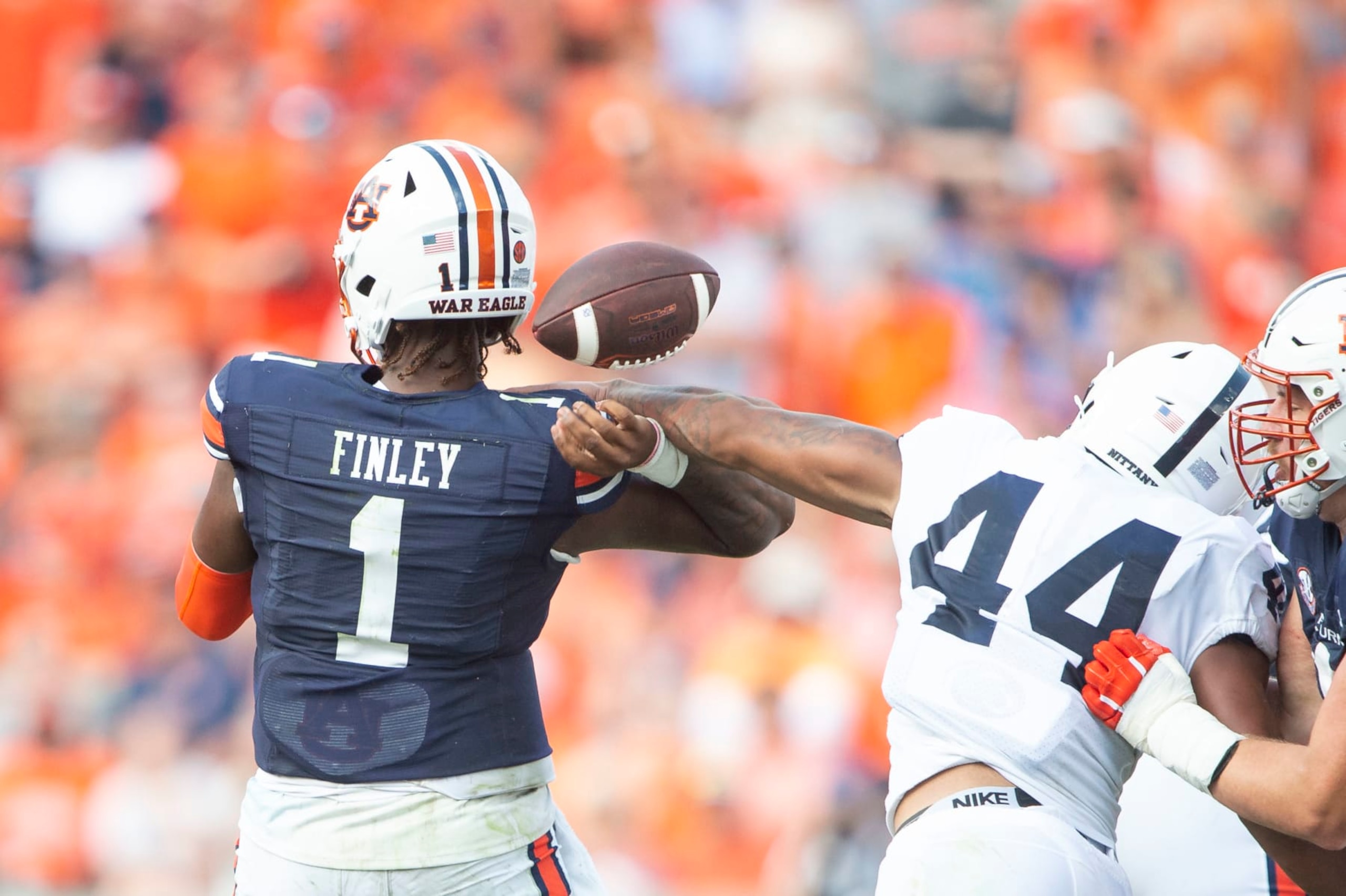 AUBURN, ALABAMA - SEPTEMBER 17: Defensive end Chop Robinson #44 of the Penn State Nittany Lions causes a fumble after hitting the arm of quarterback T.J. Finley #1 of the Auburn Tigers at Jordan-Hare Stadium on September 17, 2022 in Auburn, Alabama. (Photo by Michael Chang/Getty Images) AUBURN, ALABAMA - SEPTEMBER 17: Defensive end Chop Robinson #44 of the Penn State Nittany Lions causes a fumble after hitting the arm of quarterback T.J. Finley #1 of the Auburn Tigers at Jordan-Hare Stadium on September 17, 2022 in Auburn, Alabama. (Photo by Michael Chang/Getty Images)