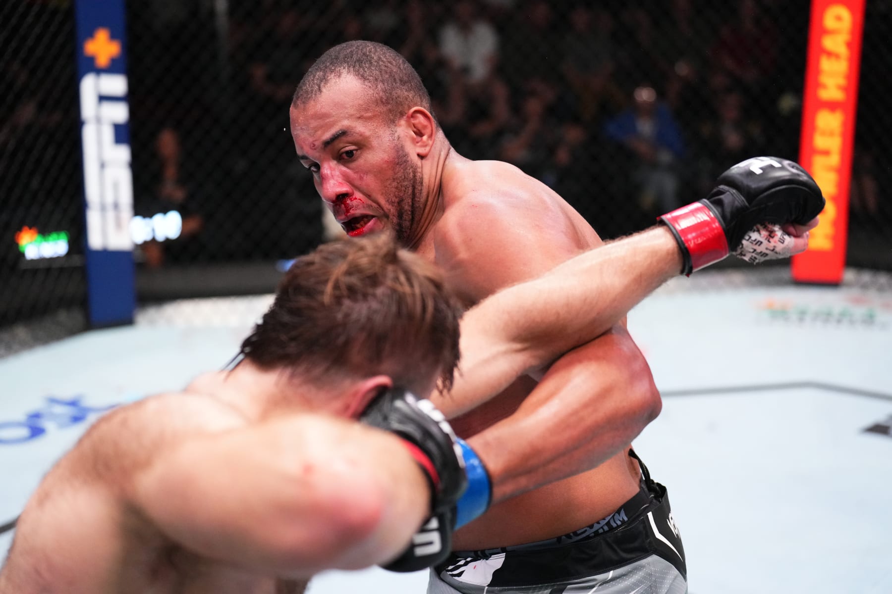 LAS VEGAS, NEVADA - SEPTEMBER 17: (R-L) Rodrigo Nascimento of Brazil punches Tanner Boser of Canada in a heavyweight fight during the UFC Fight Night event at UFC APEX on September 17, 2022 in Las Vegas, Nevada. (Photo by Chris Unger/Zuffa LLC)
