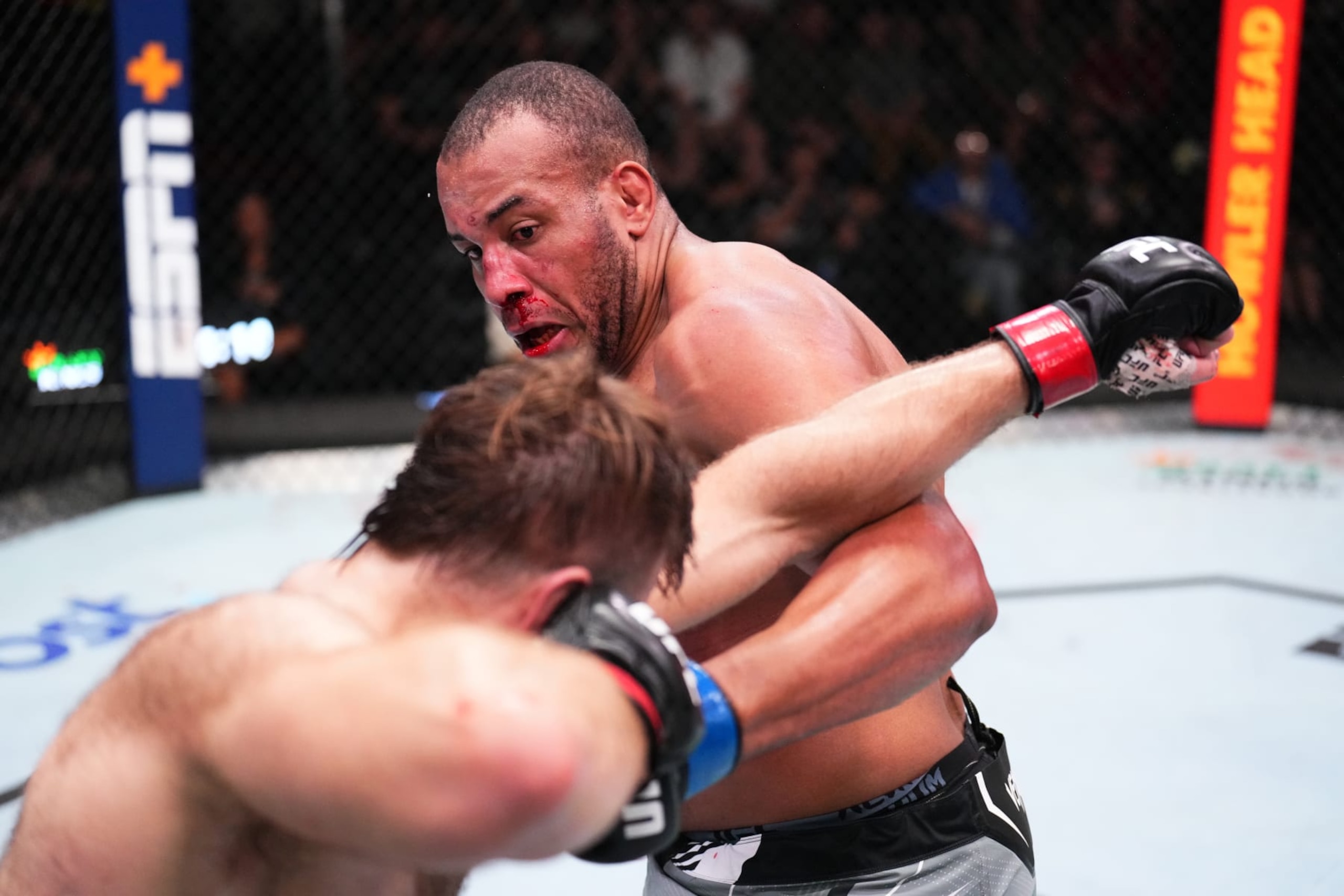 LAS VEGAS, NEVADA - SEPTEMBER 17: (R-L) Rodrigo Nascimento of Brazil punches Tanner Boser of Canada in a heavyweight fight during the UFC Fight Night event at UFC APEX on September 17, 2022 in Las Vegas, Nevada. (Photo by Chris Unger/Zuffa LLC)