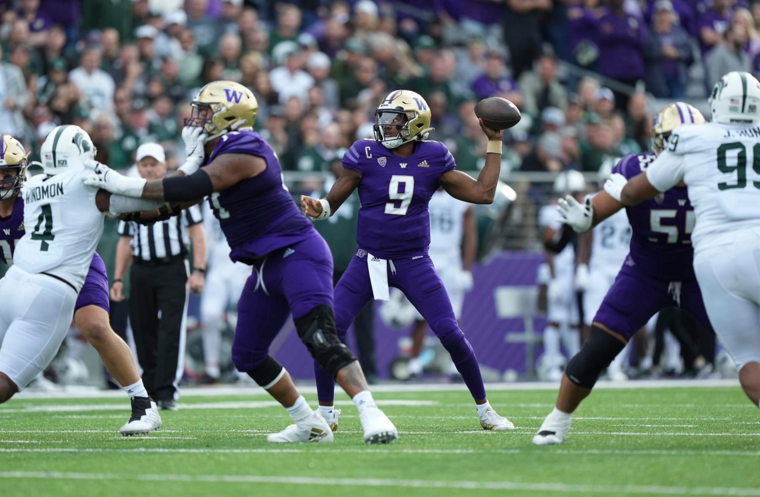 SEATTLE, WA - SEPTEMBER 17: Washington Huskies quarterback Michael Penix Jr. (9) drops back to pass during a NCAA non-conference football game between the Michigan State Spartans and the Washington Huskies on September 17, 2022 at Husky Stadium in Seattle, WA. (Photo by Jeff Halstead/Icon Sportswire via Getty Images)