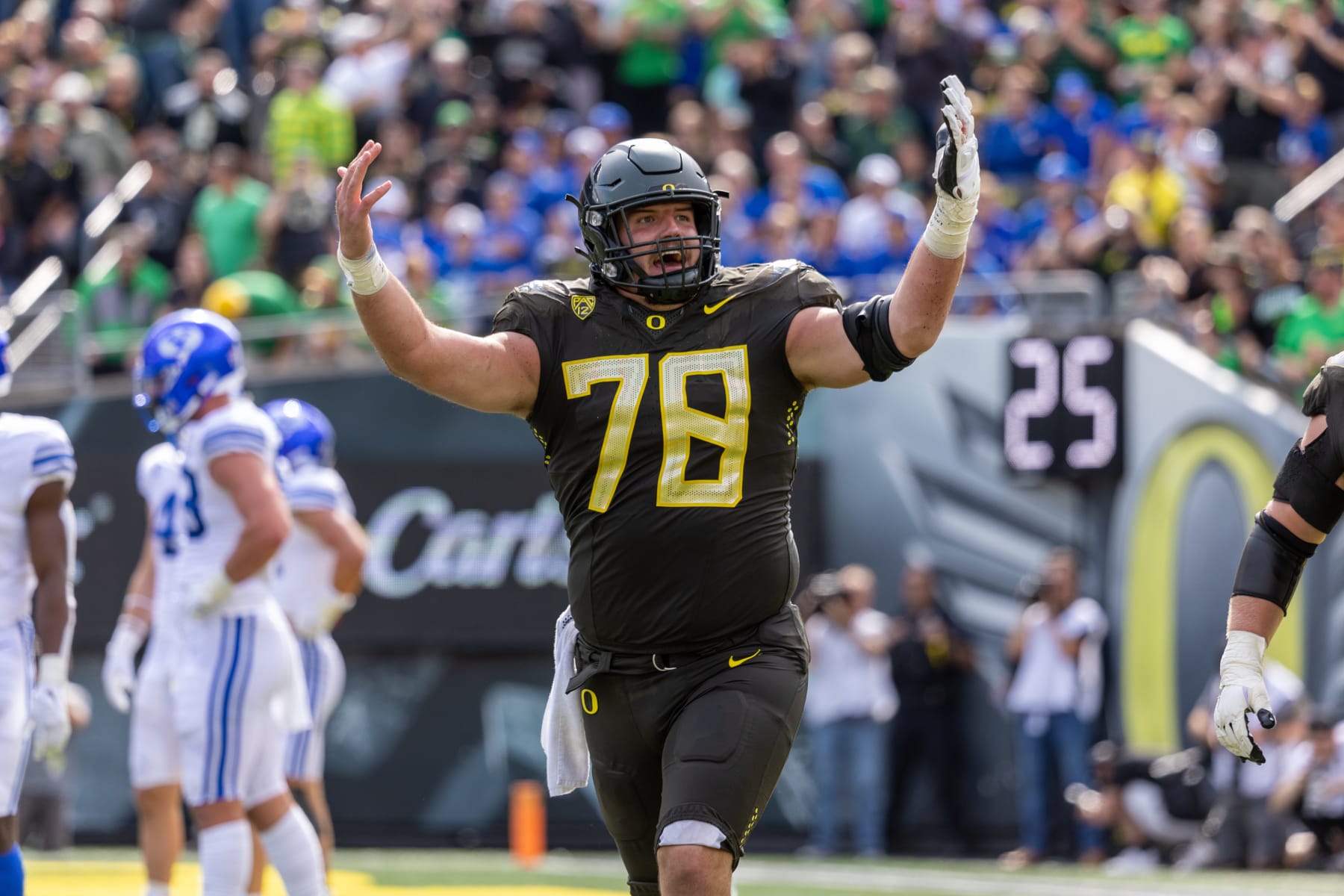 EUGENE, OR - SEPTEMBER 17: Offensive lineman Alex Forsyth #78 of the Oregon Ducks celebrates against the Brigham Young Cougars  during the second half at Autzen Stadium on September 17, 2022 in Eugene, Oregon. (Photo by Tom Hauck/Getty Images)