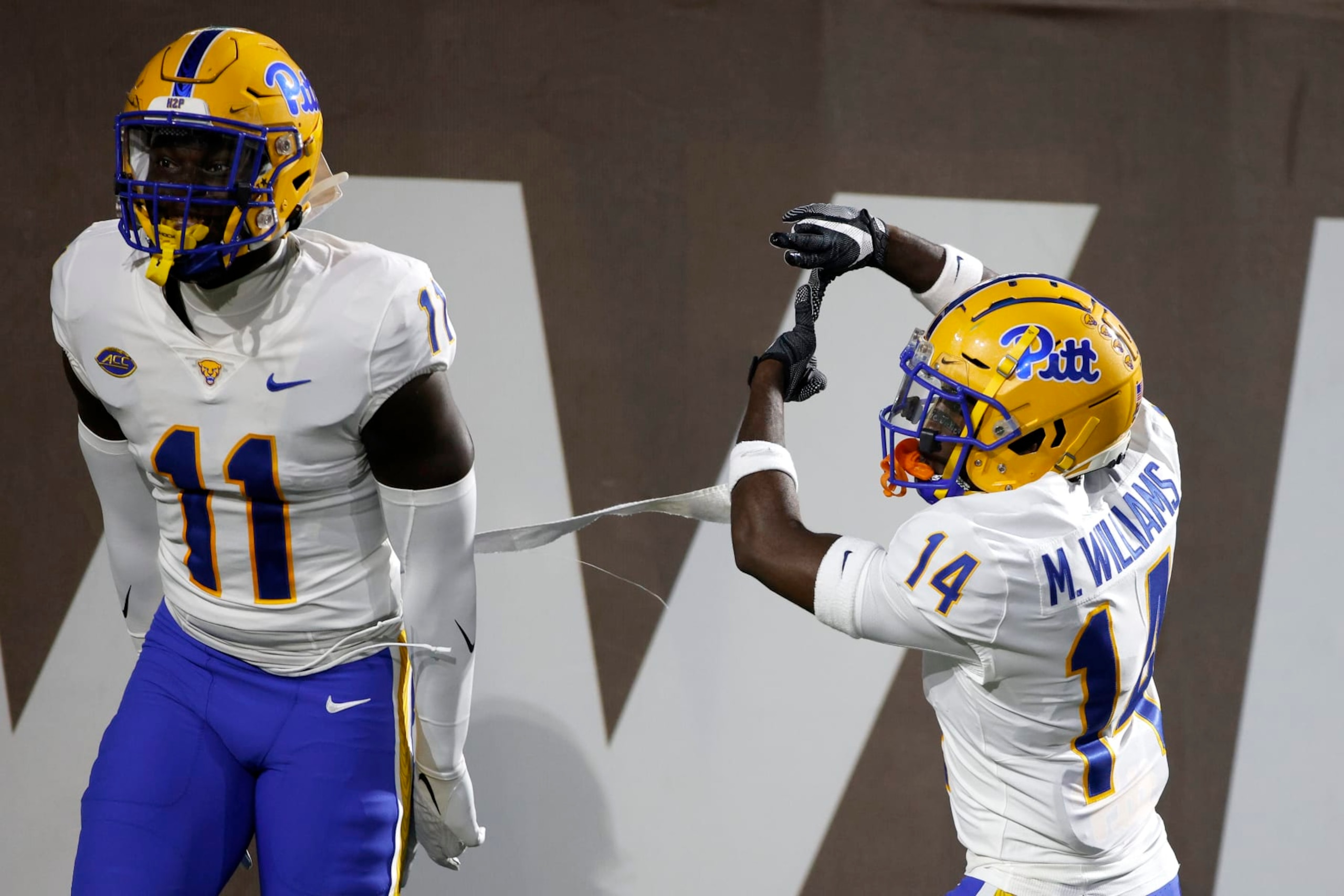 Pittsburgh's Marquis Williams, right, and Bangally Kamara (11) celebrate Williams' touchdown on an interception against Western Michigan during the first half of an NCAA college football game, Saturday, Sept. 17, 2022, in Kalamazoo, Mich. (AP Photo/Al Goldis) Pittsburgh's Marquis Williams, right, and Bangally Kamara (11) celebrate Williams' touchdown on an interception against Western Michigan during the first half of an NCAA college football game, Saturday, Sept. 17, 2022, in Kalamazoo, Mich. (AP Photo/Al Goldis)