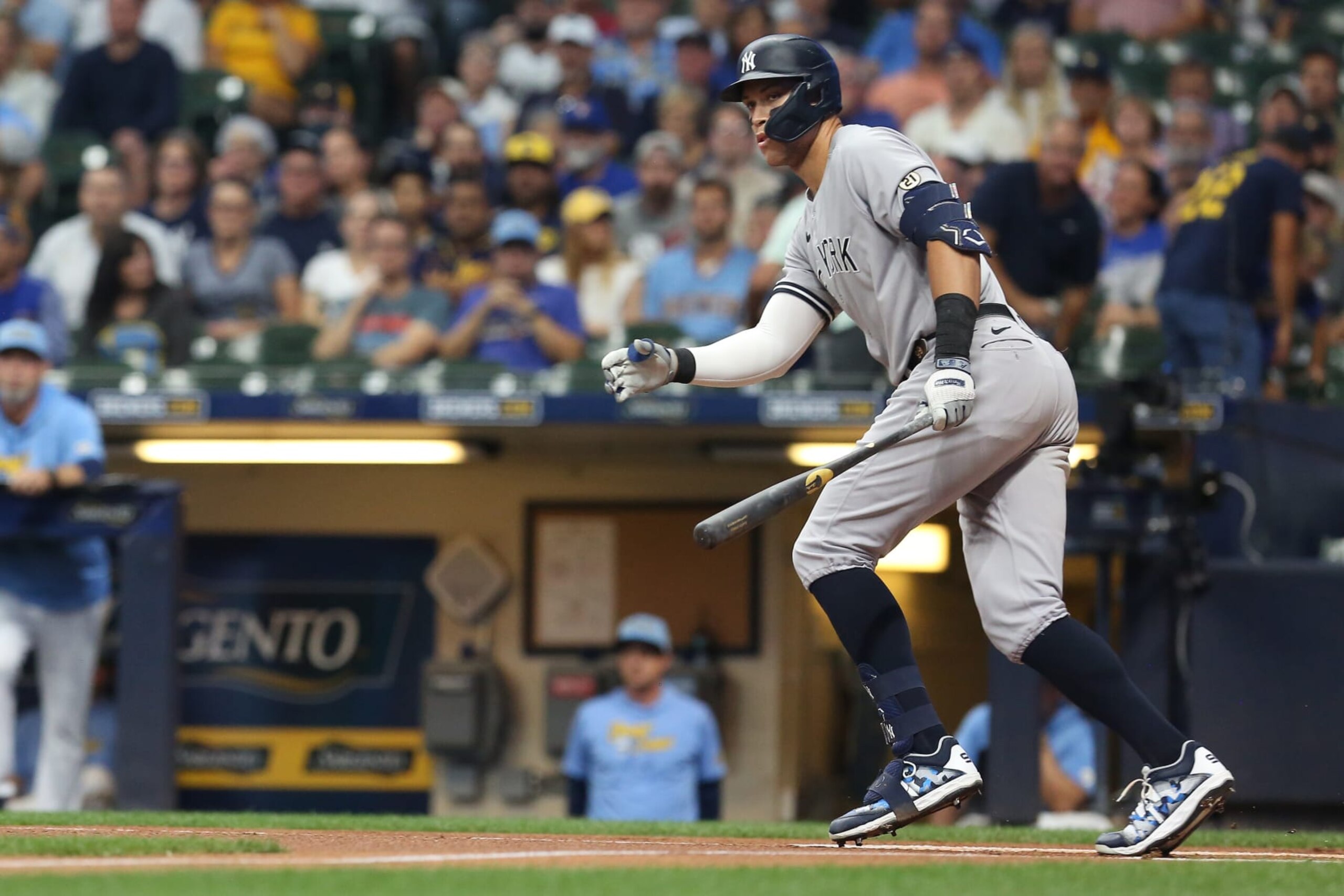 MILWAUKEE, WI - SEPTEMBER 16: New York Yankees center fielder Aaron Judge (99) gets an infield single during a game between the Milwaukee Brewers and the New York Yankees on September 16, 2022, at American Family Field in Milwaukee, WI. (Photo by Larry Radloff/Icon Sportswire via Getty Images)