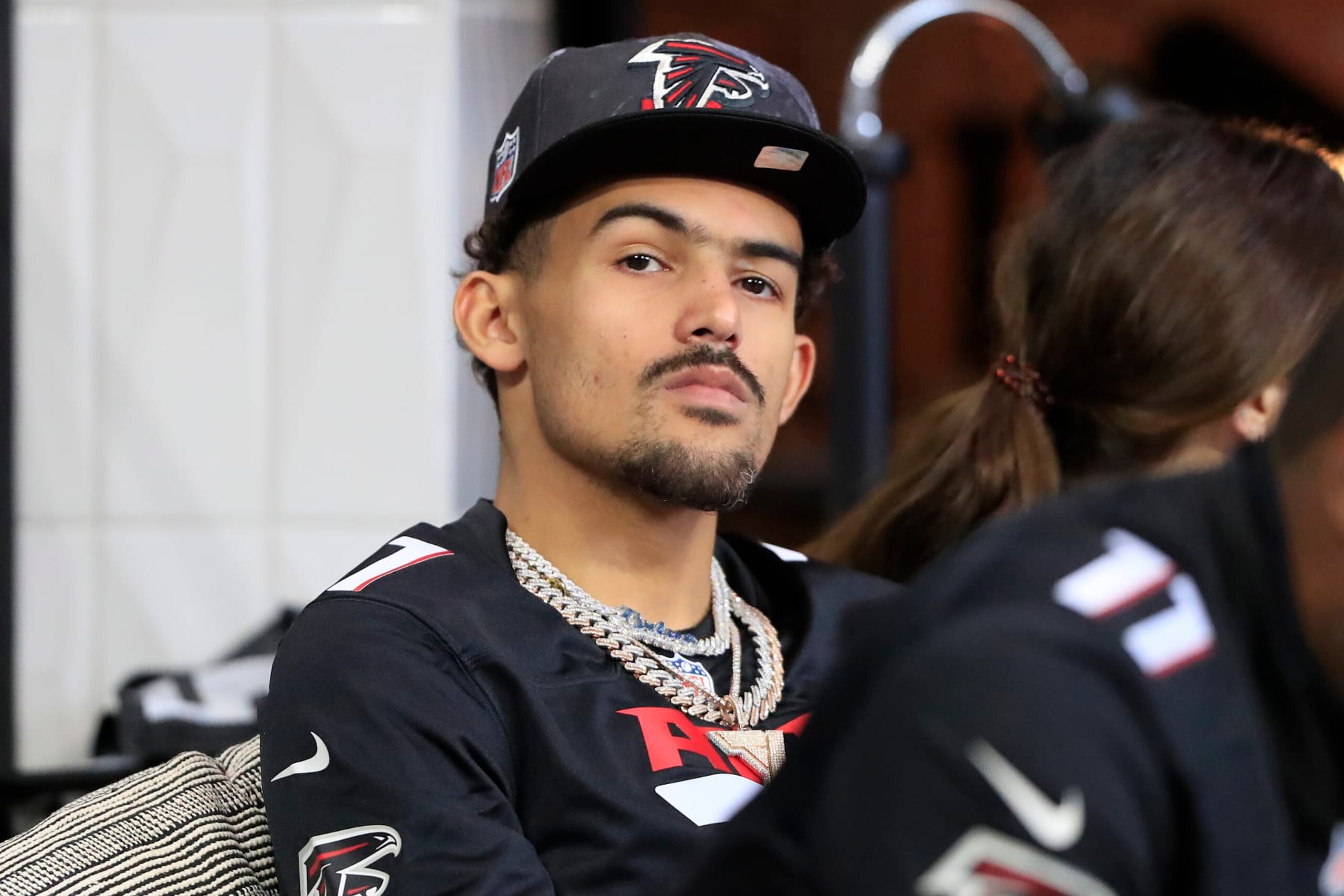 ATLANTA, GA - SEPTEMBER 11: Atlanta Hawks basketball star Trae Young watches the game from a field level suite during the Week 1 NFL game between the New Orleans Saints and the Atlanta Falcons on Septermber 11, 2022 at the Mercedes-Benz Stadium in Atlanta, Georgia.(Photo by David J. Griffin/Icon Sportswire via Getty Images) ATLANTA, GA - SEPTEMBER 11: Atlanta Hawks basketball star Trae Young watches the game from a field level suite during the Week 1 NFL game between the New Orleans Saints and the Atlanta Falcons on Septermber 11, 2022 at the Mercedes-Benz Stadium in Atlanta, Georgia.(Photo by David J. Griffin/Icon Sportswire via Getty Images)