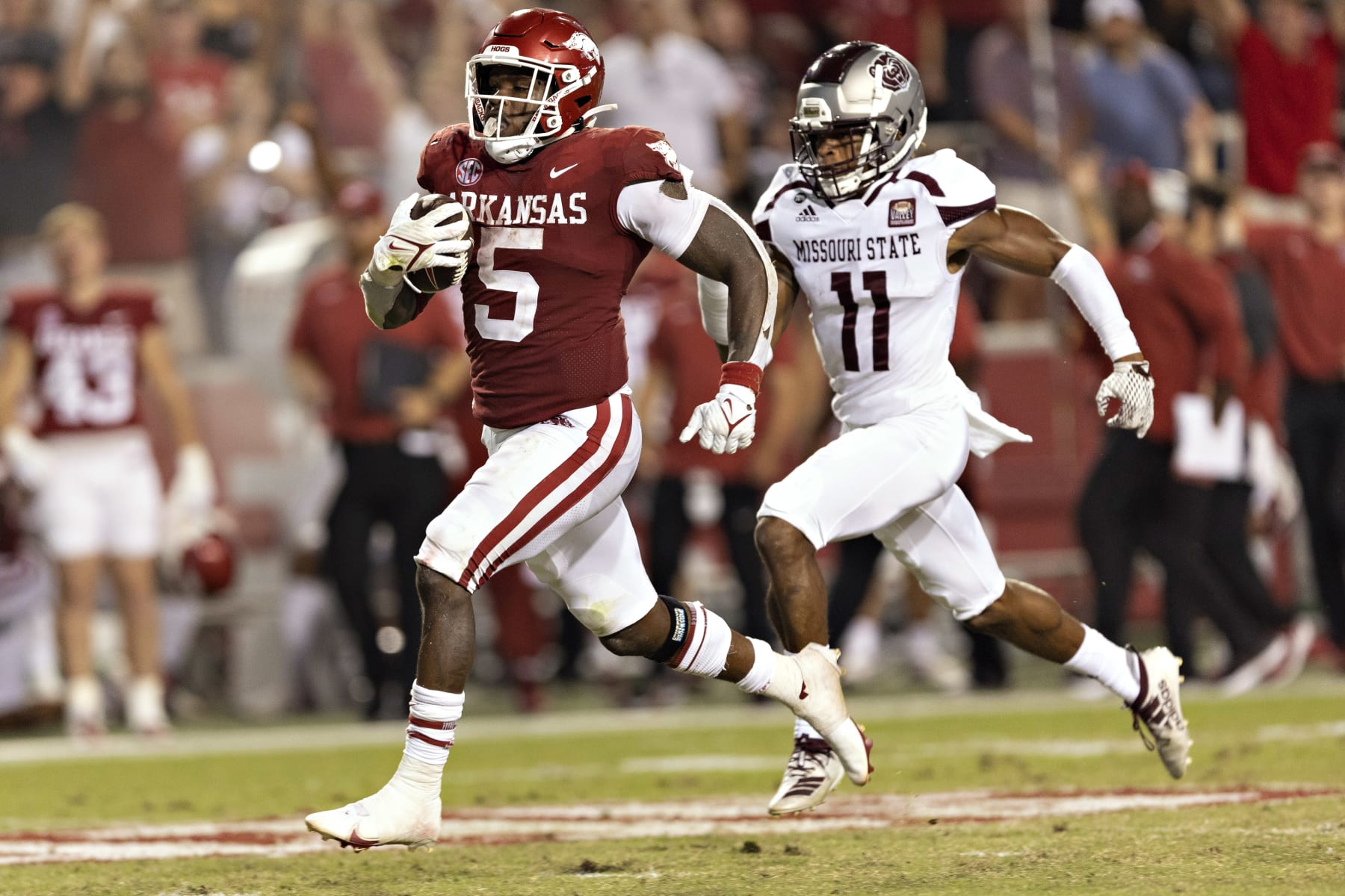 FAYETTEVILLE, ARKANSAS - SEPTEMBER 17: Raheim Sanders #5 of the Arkansas Razorbacks runs the ball in for a touchdown in the second half of game against the Missouri State Bears at Donald W. Reynolds Razorback Stadium on September 17, 2022 in Fayetteville, Arkansas. The Razorbacks defeated the Bears 38-27.  (Photo by Wesley Hitt/Getty Images)