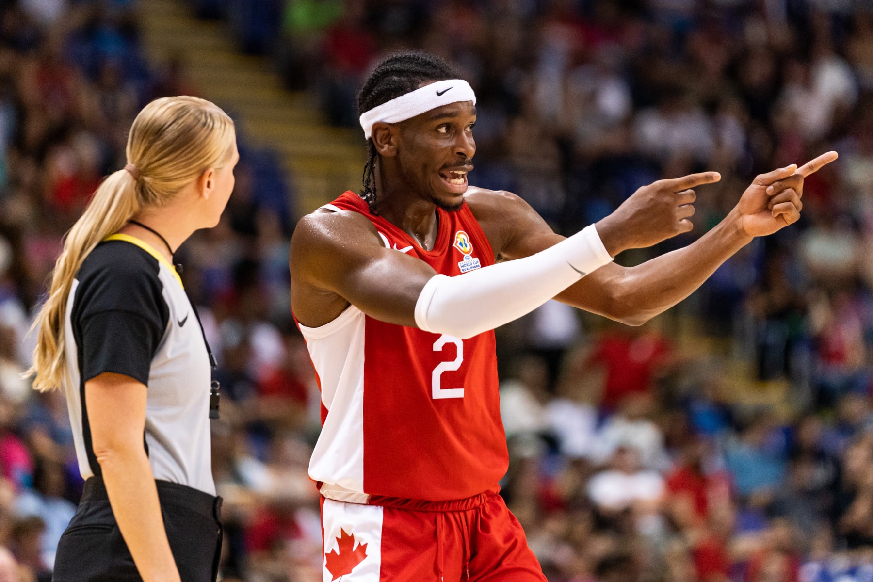 VICTORIA, BC - AUGUST 25: Shai Gilgeous-Alexander #2 of Canada has a conversation with the referee in the game against Argentina during the Second Round of the FIBA World Cup 2023 Americas Qualifiers at Save-On-Foods Memorial Centre on August 25, 2022 in Victoria, Canada. (Photo by Jordan Jones/Getty Images)