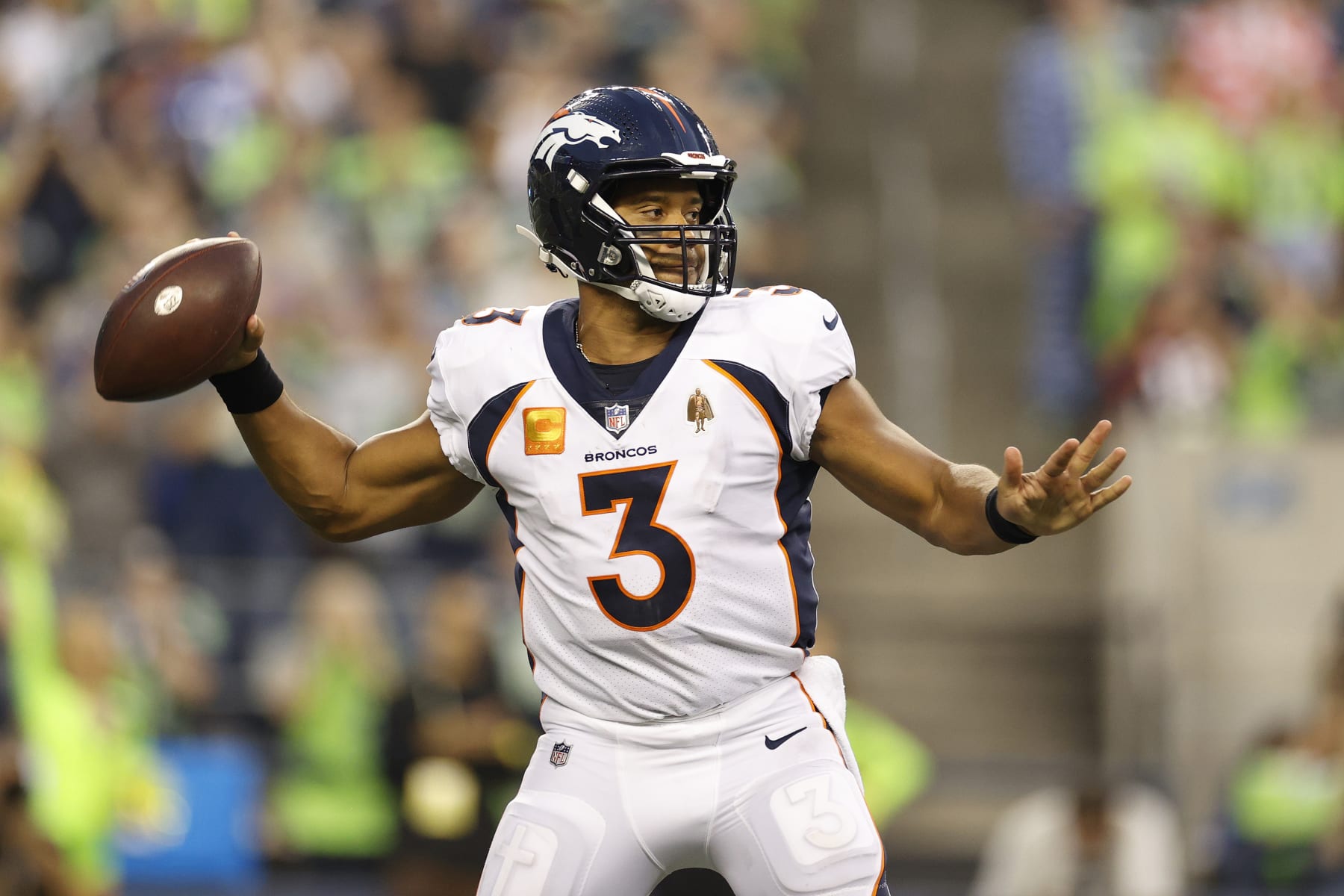 SEATTLE, WASHINGTON - SEPTEMBER 12: Russell Wilson #3 of the Denver Broncos looks to pass during the fourth quarter against the Seattle Seahawks at Lumen Field on September 12, 2022 in Seattle, Washington. (Photo by Steph Chambers/Getty Images)