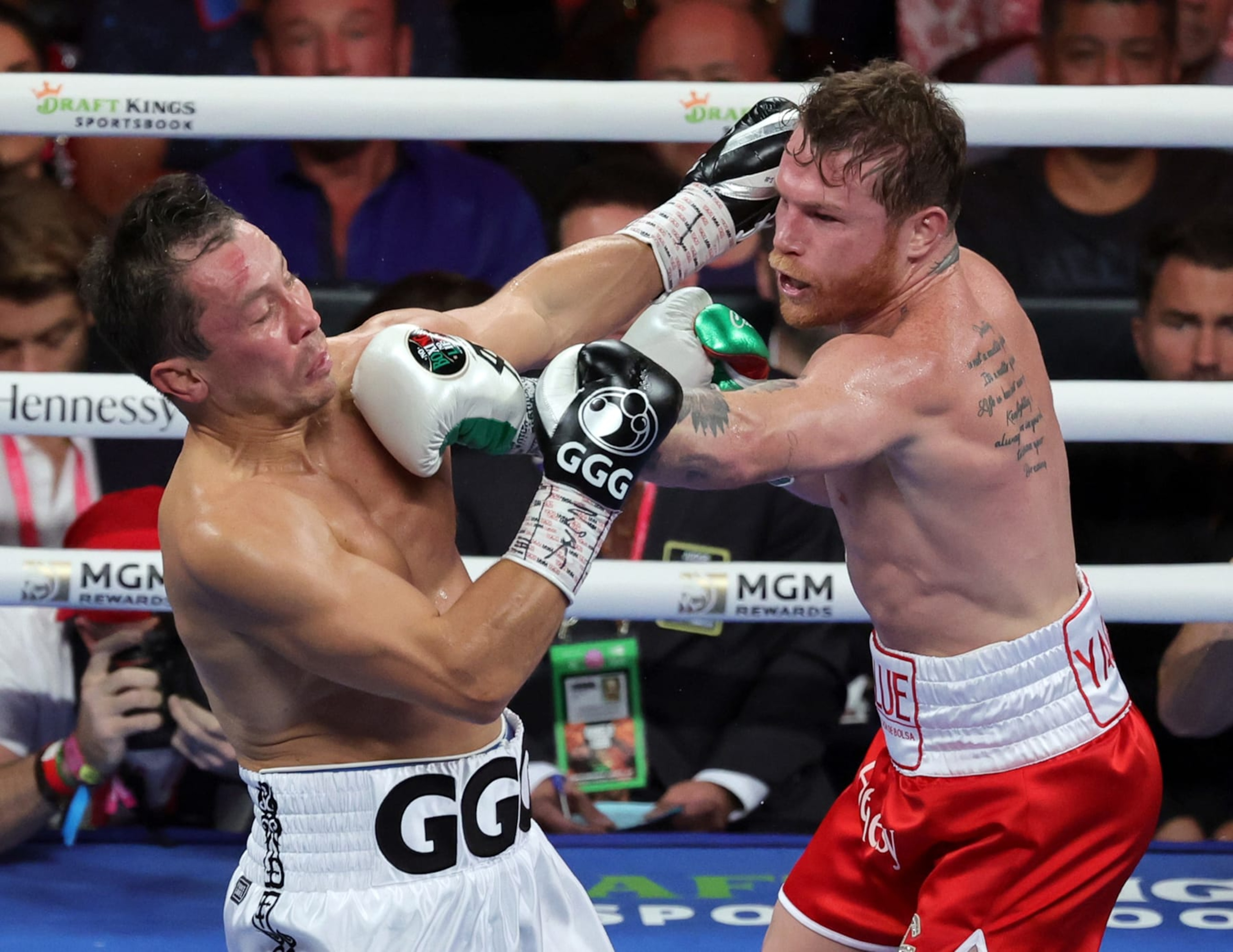 LAS VEGAS, NEVADA - SEPTEMBER 17: Canelo Alvarez (R) throws a left at Gennadiy Golovkin in the third round of their super middleweight title fight at T-Mobile Arena on September 17, 2022 in Las Vegas, Nevada. Alvarez retained his titles with a unanimous-decision victory. (Photo by Ethan Miller/Getty Images)
