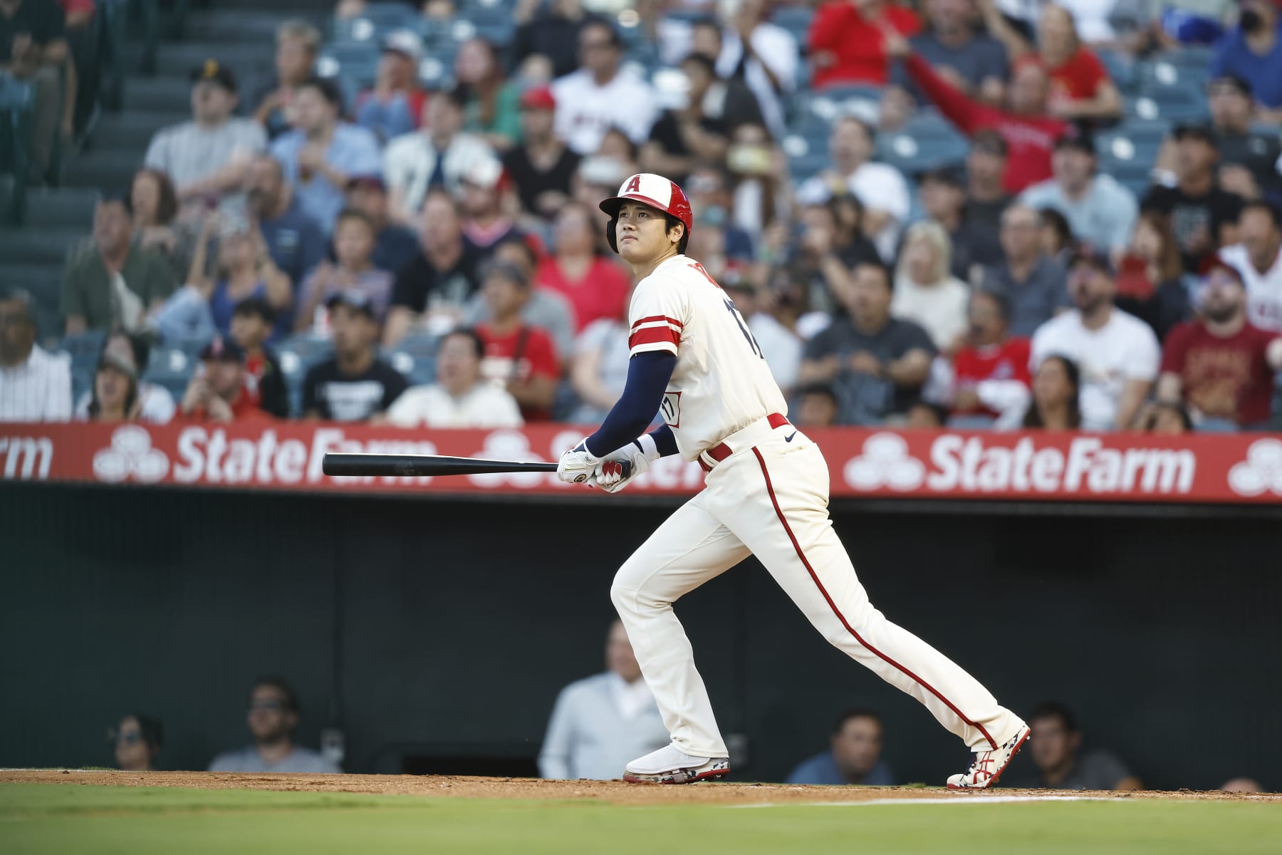 ANAHEIM, CALIFORNIA - SEPTEMBER 17: Shohei Ohtani #17 of the Los Angeles Angels looks on as he hits an rbi double against the Seattle Mariners during the first inning at Angel Stadium of Anaheim on September 17, 2022 in Anaheim, California. (Photo by Michael Owens/Getty Images)