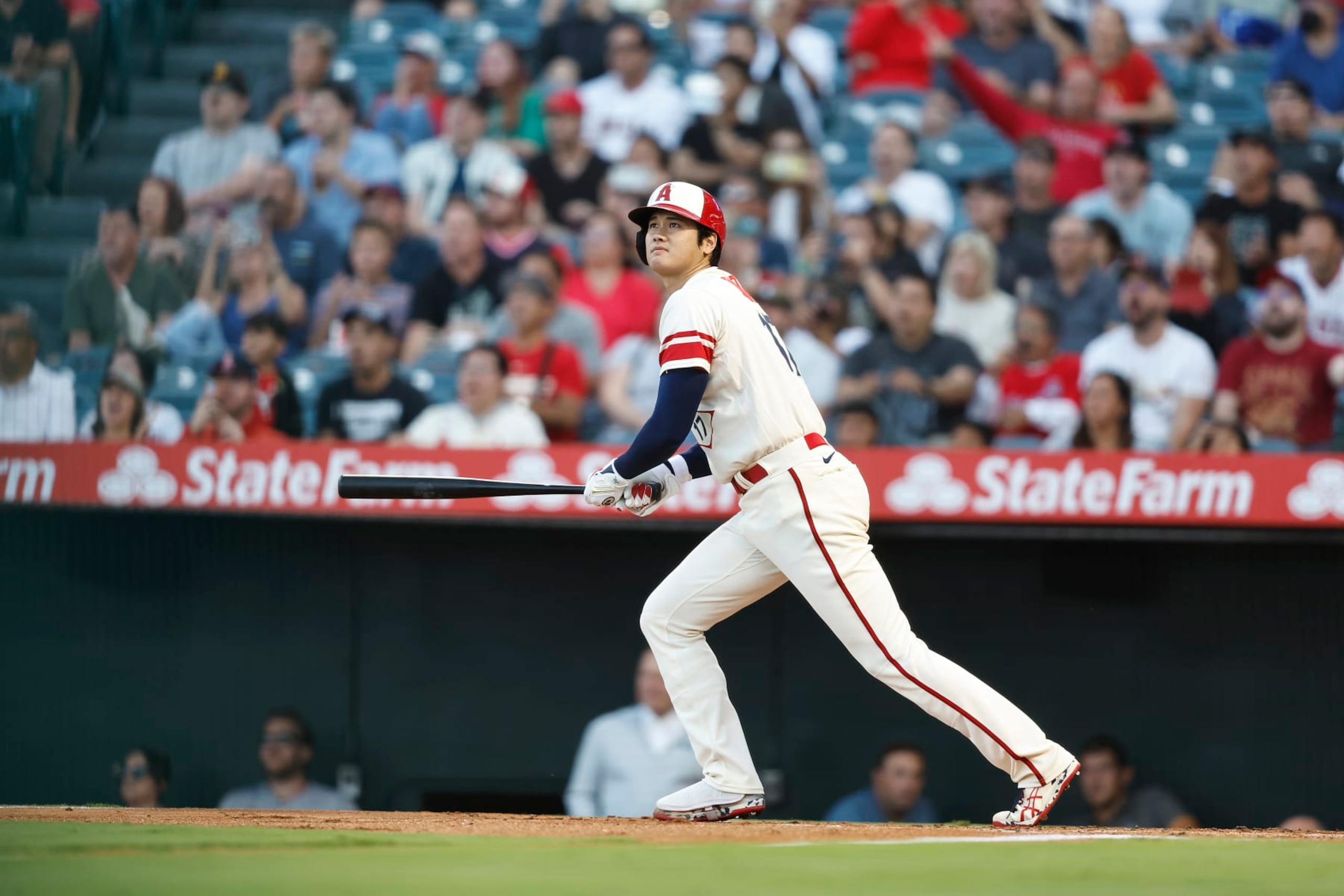 ANAHEIM, CALIFORNIA - SEPTEMBER 17: Shohei Ohtani #17 of the Los Angeles Angels looks on as he hits an rbi double against the Seattle Mariners during the first inning at Angel Stadium of Anaheim on September 17, 2022 in Anaheim, California. (Photo by Michael Owens/Getty Images)
