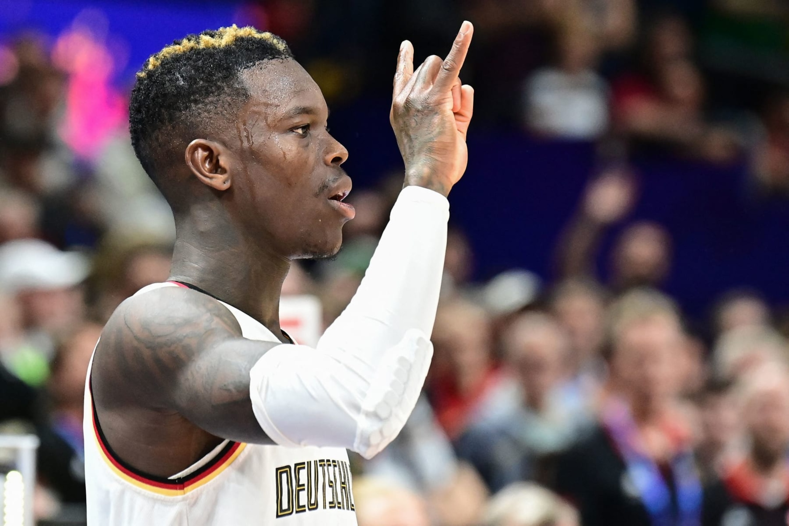 Germany's Dennis Schroder gestures during the FIBA Eurobasket 2022 semi-final basketball match between Germany and Spain in Berlin on September 16, 2022. (Photo by Tobias SCHWARZ / AFP) (Photo by TOBIAS SCHWARZ/AFP via Getty Images)