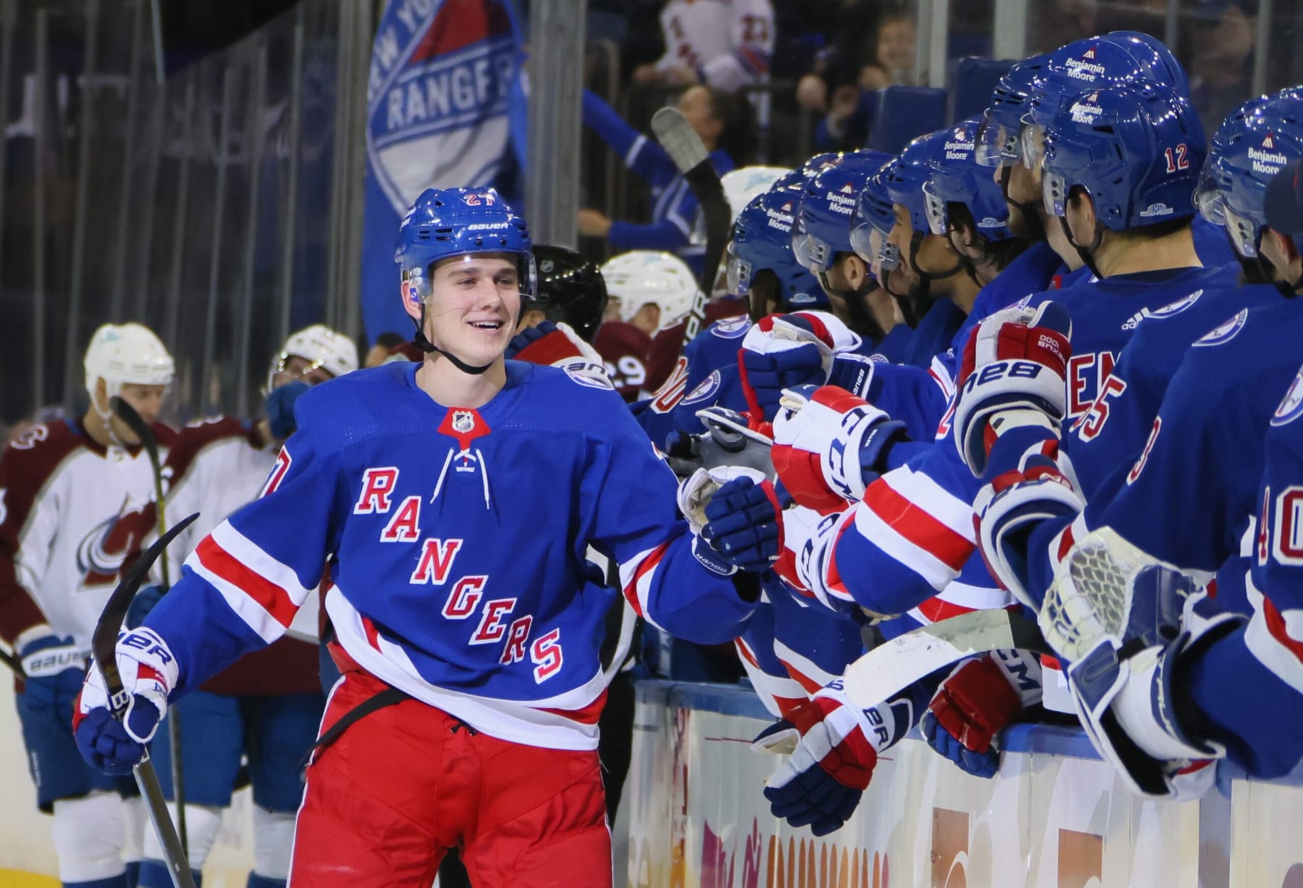 NEW YORK, NEW YORK - DECEMBER 08: Nils Lundkvist #27 of the New York Rangers celebrates his first NHL goal at 18:15 of the first period against the Colorado Avalanche at Madison Square Garden on December 08, 2021 in New York City. (Photo by Bruce Bennett/Getty Images)