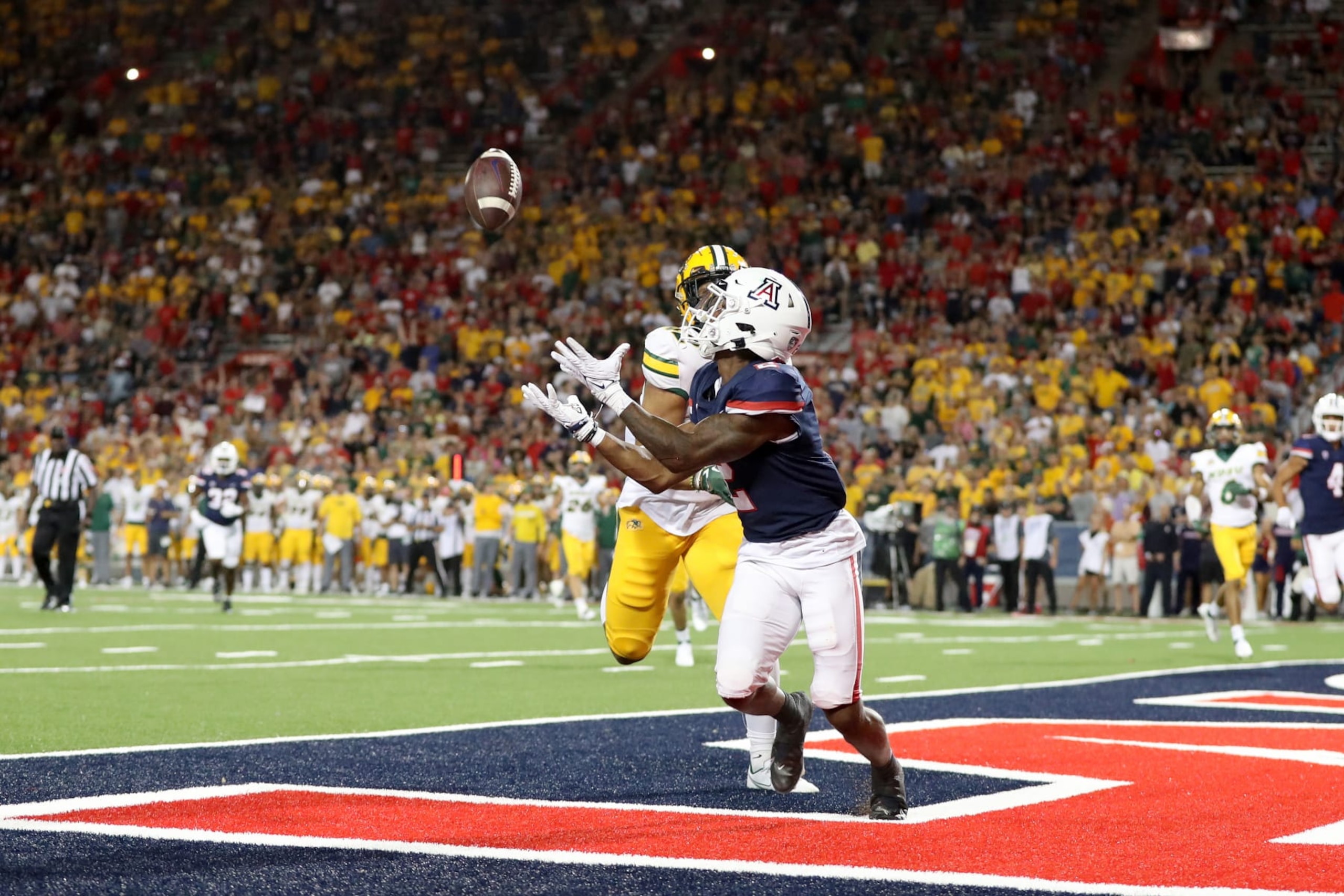 TUCSON, AZ - SEPTEMBER 17: Arizona Wildcats wide receiver Jacob Cowing #2 catches the winning touchdown in the 4th quarter of a college football game between the North Dakota State Bison and the University of Arizona Wildcats on September 17, 2022 at Arizona Stadium in Tucson, AZ.  (Photo by Christopher Hook/Icon Sportswire via Getty Images)