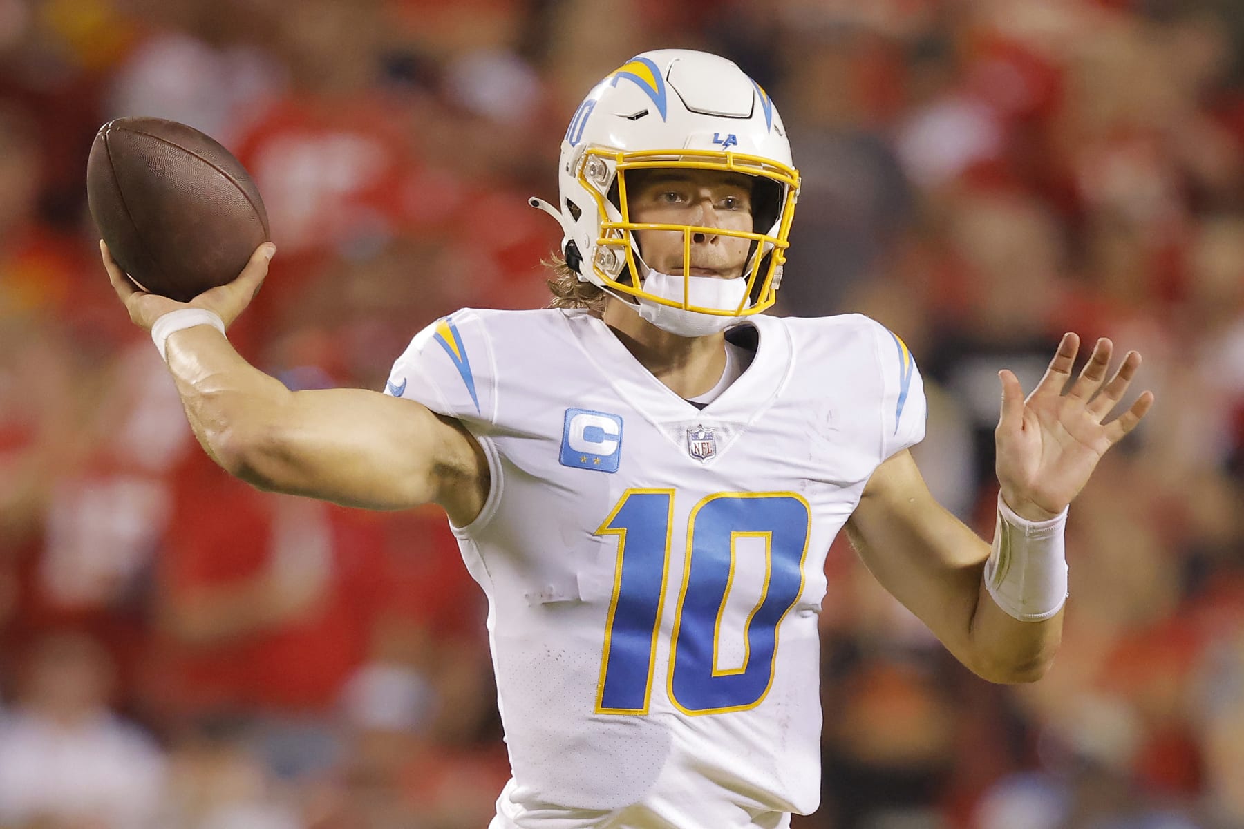 KANSAS CITY, MISSOURI - SEPTEMBER 15: Justin Herbert #10 of the Los Angeles Chargers throws the ball during the second half against the Kansas City Chiefs at Arrowhead Stadium on September 15, 2022 in Kansas City, Missouri. (Photo by David Eulitt/Getty Images)