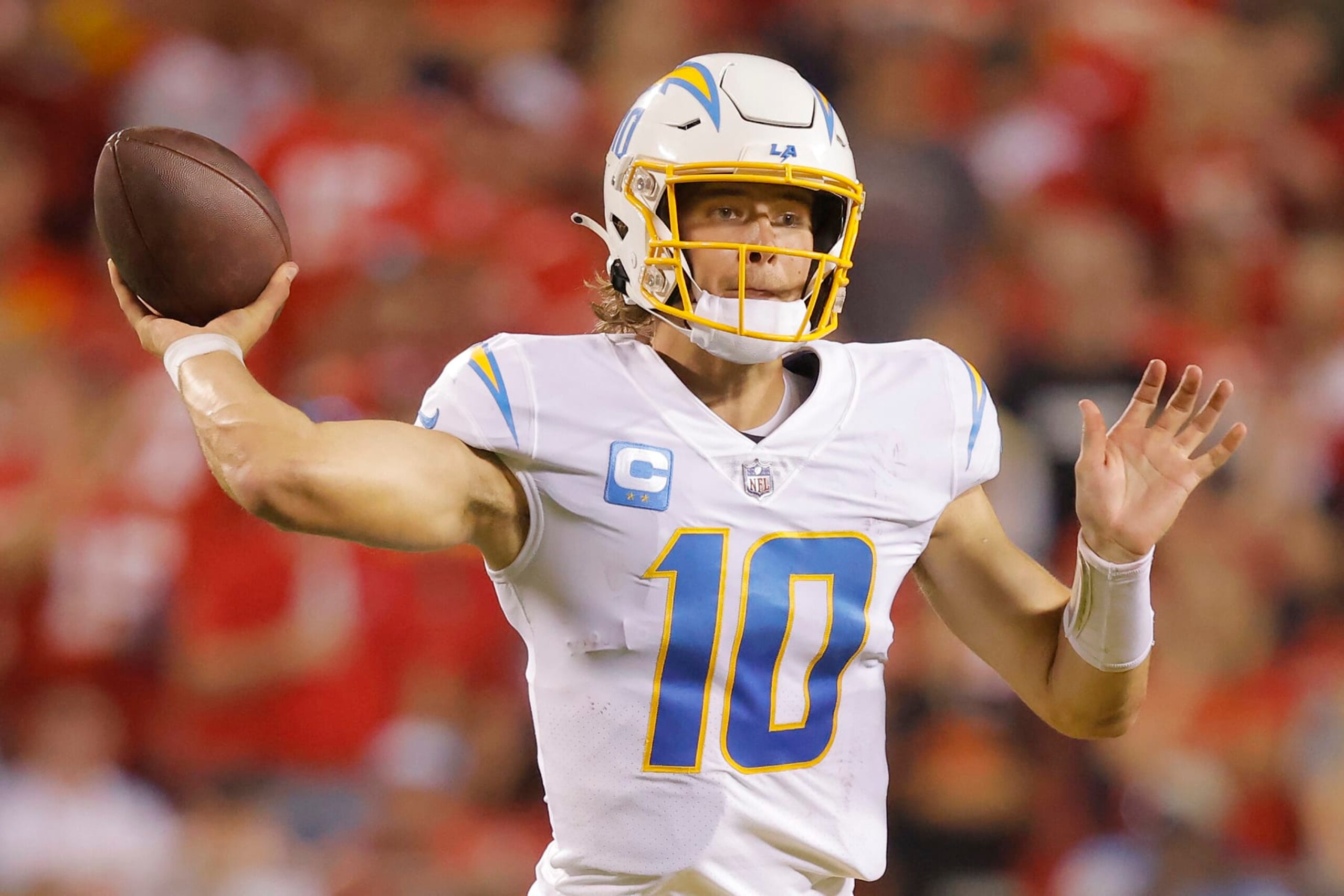 KANSAS CITY, MISSOURI - SEPTEMBER 15: Justin Herbert #10 of the Los Angeles Chargers throws the ball during the second half against the Kansas City Chiefs at Arrowhead Stadium on September 15, 2022 in Kansas City, Missouri. (Photo by David Eulitt/Getty Images) KANSAS CITY, MISSOURI - SEPTEMBER 15: Justin Herbert #10 of the Los Angeles Chargers throws the ball during the second half against the Kansas City Chiefs at Arrowhead Stadium on September 15, 2022 in Kansas City, Missouri. (Photo by David Eulitt/Getty Images)