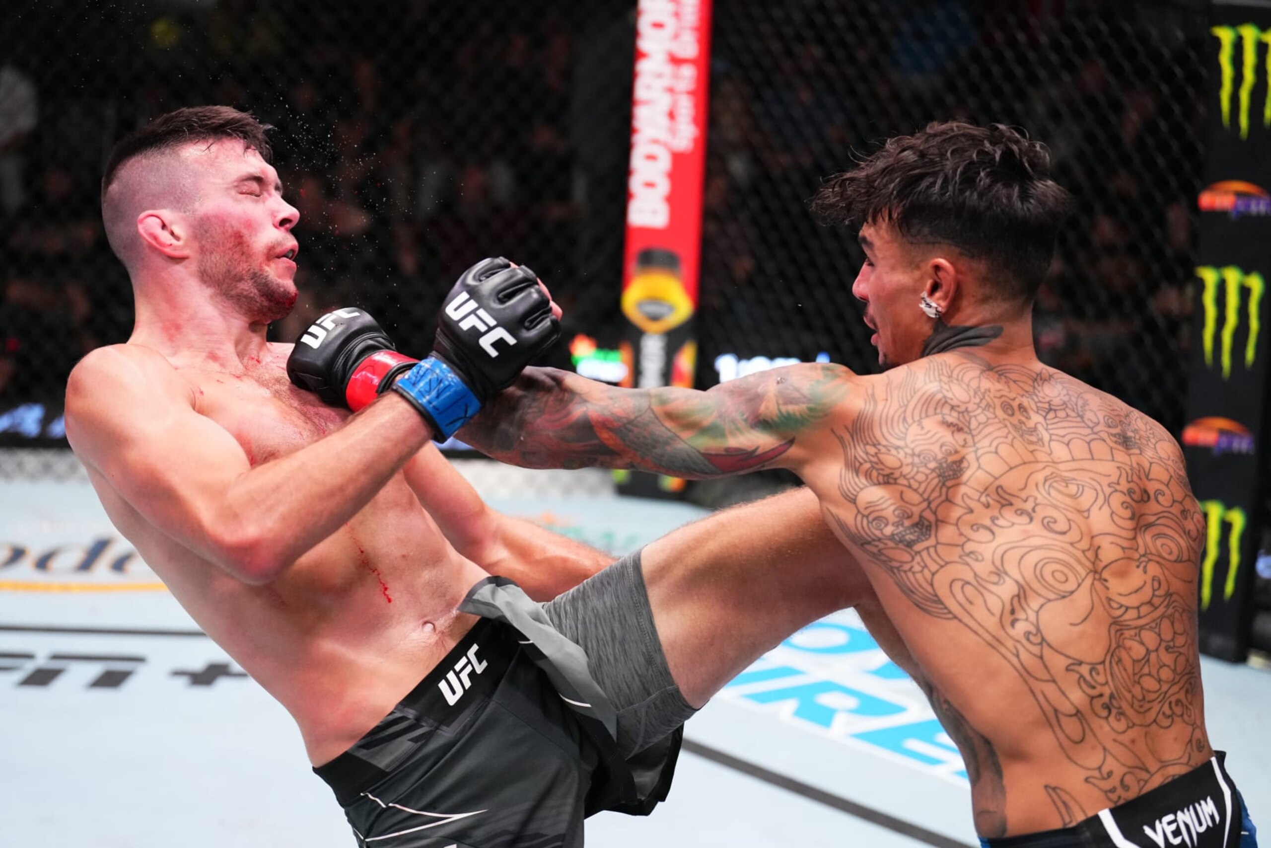 LAS VEGAS, NEVADA - SEPTEMBER 17: (R-L) Andre Fili punches Bill Algeo in a featherweight fight during the UFC Fight Night event at UFC APEX on September 17, 2022 in Las Vegas, Nevada. (Photo by Chris Unger/Zuffa LLC)