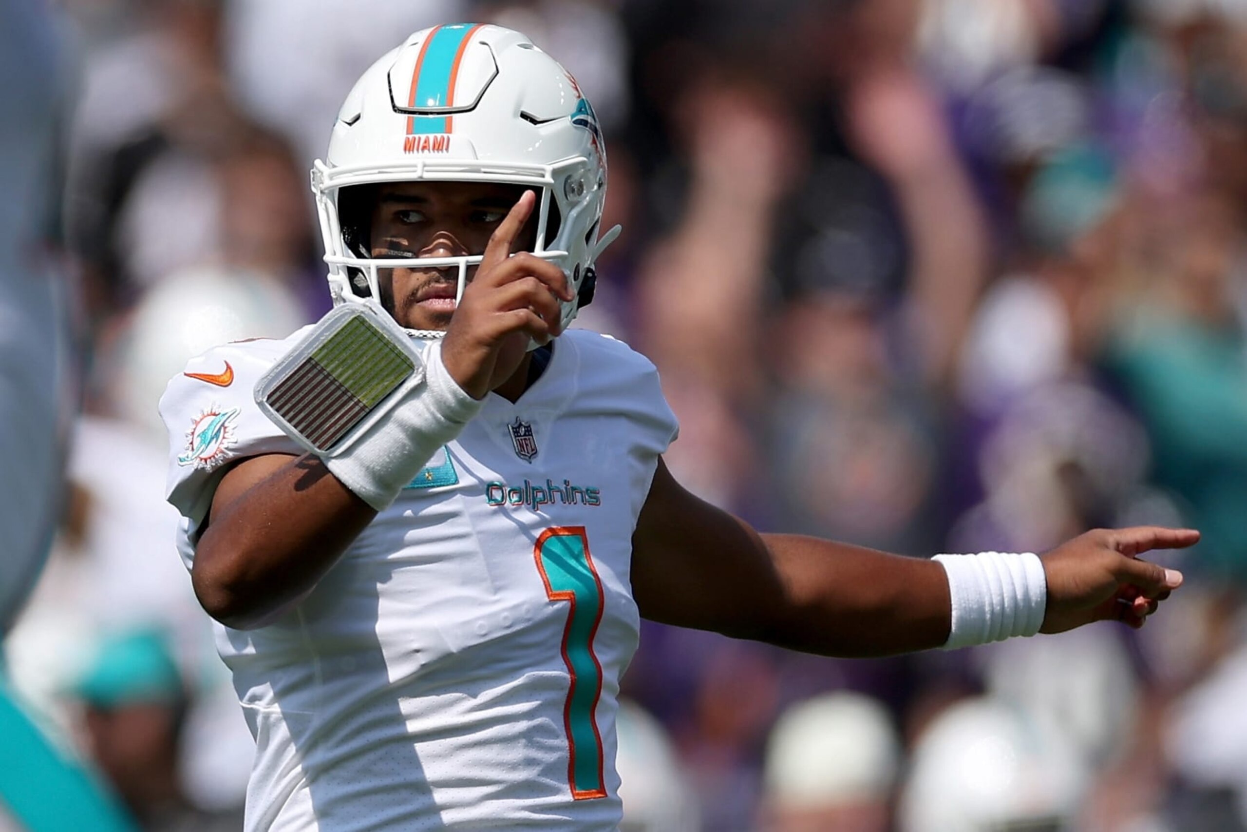 BALTIMORE, MARYLAND - SEPTEMBER 18: Tua Tagovailoa #1 of the Miami Dolphins celebrates a touchdown in the second quarter against the Baltimore Ravens at M&T Bank Stadium on September 18, 2022 in Baltimore, Maryland. (Photo by Patrick Smith/Getty Images)