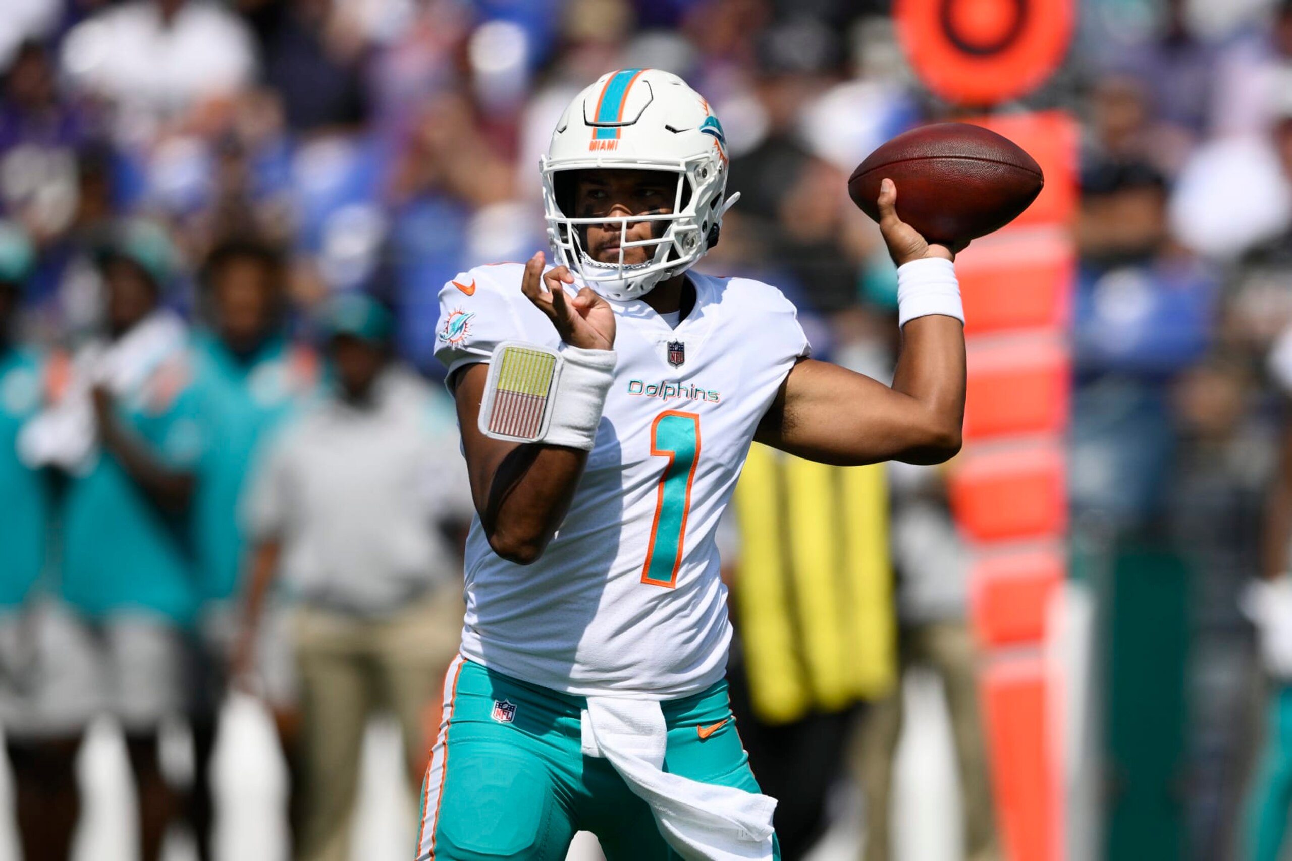 Miami Dolphins quarterback Tua Tagovailoa (1) aims a pass during the first half of an NFL football game against the Baltimore Ravens, Sunday, Sept. 18, 2022, in Baltimore. (AP Photo/Nick Wass)