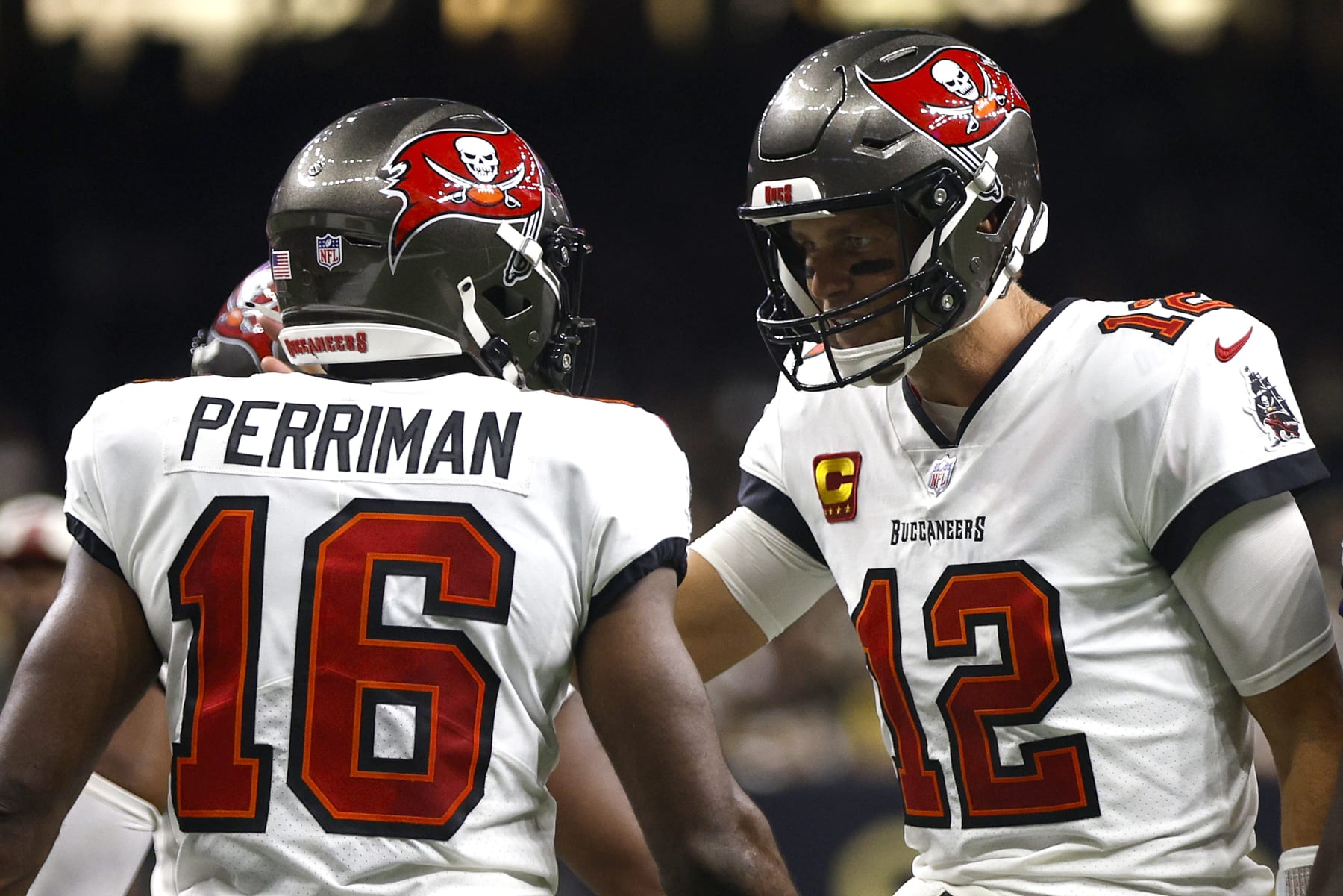 NEW ORLEANS, LOUISIANA - SEPTEMBER 18: Tom Brady #12 of the Tampa Bay Buccaneers reacts after Breshad Perriman #16 of the Tampa Bay Buccaneers catches the touchdown pass in the fourth quarter of the game against the New Orleans Saints at Caesars Superdome on September 18, 2022 in New Orleans, Louisiana. (Photo by Chris Graythen/Getty Images)