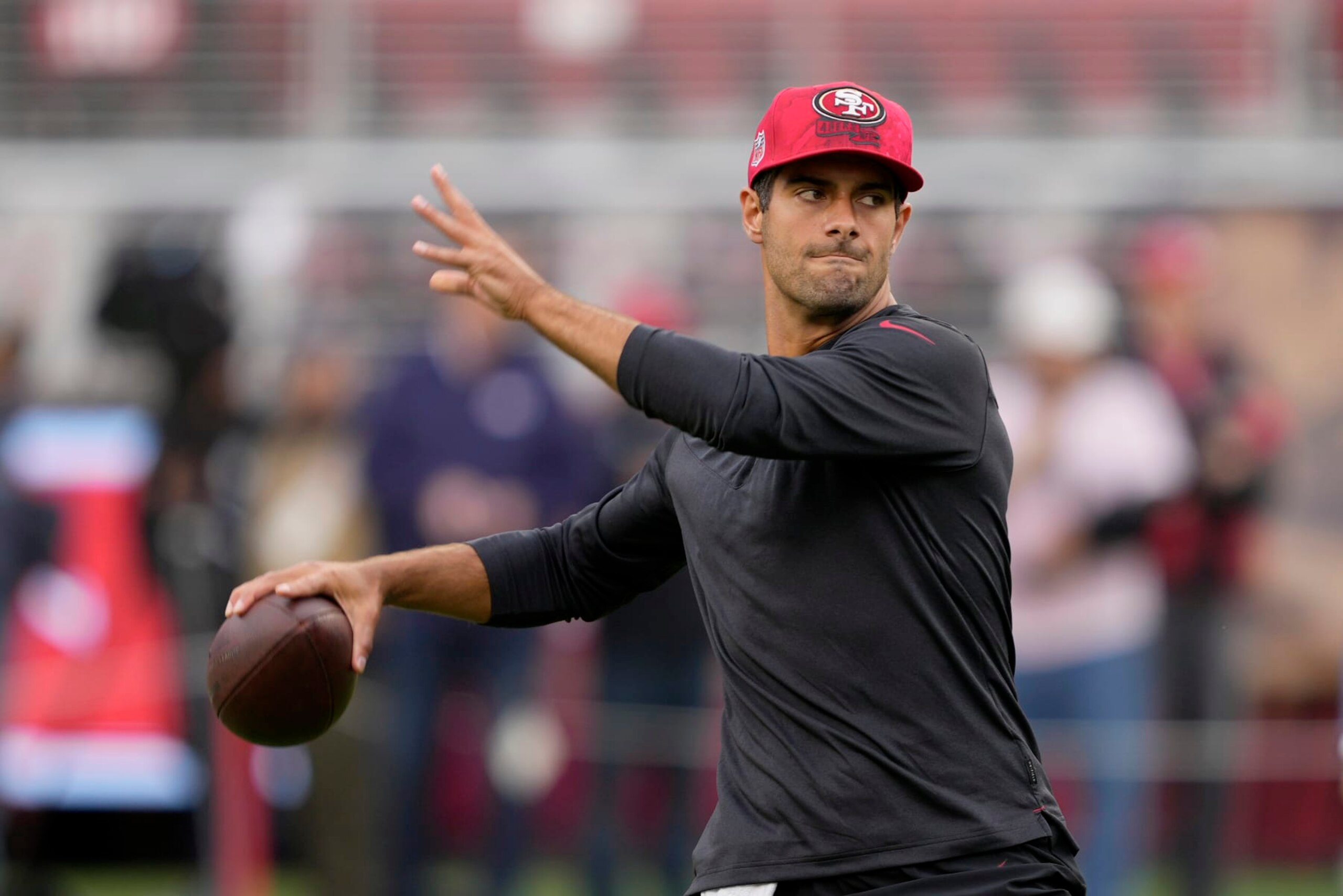 San Francisco 49ers quarterback Jimmy Garoppolo warms up before an NFL football game against the Seattle Seahawks in Santa Clara, Calif., Sunday, Sept. 18, 2022. (AP Photo/Tony Avelar)