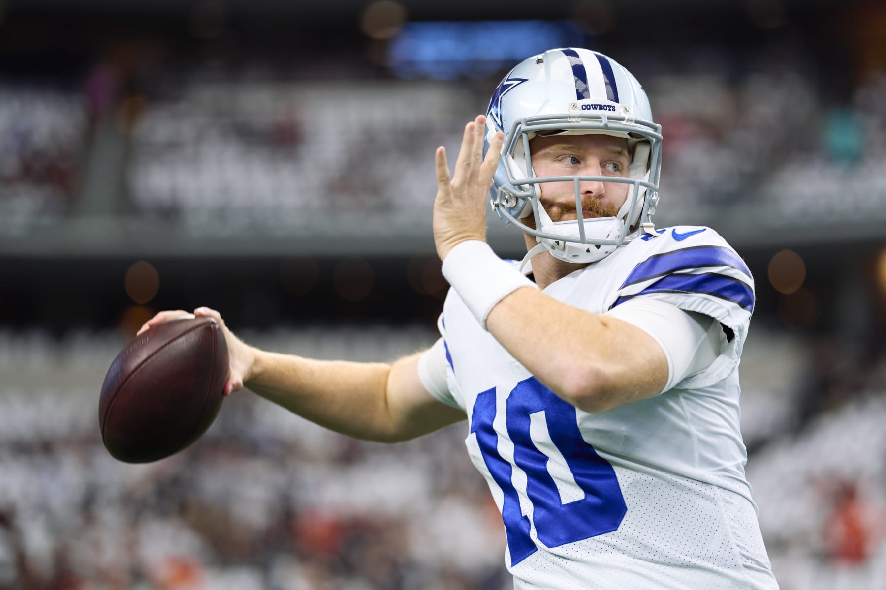 ARLINGTON, TX - SEPTEMBER 18: Cooper Rush #10 of the Dallas Cowboys warms up before kickoff against the Cincinnati Bengals at AT&T Stadium on September 18, 2022 in Arlington, Texas. (Photo by Cooper Neill/Getty Images)