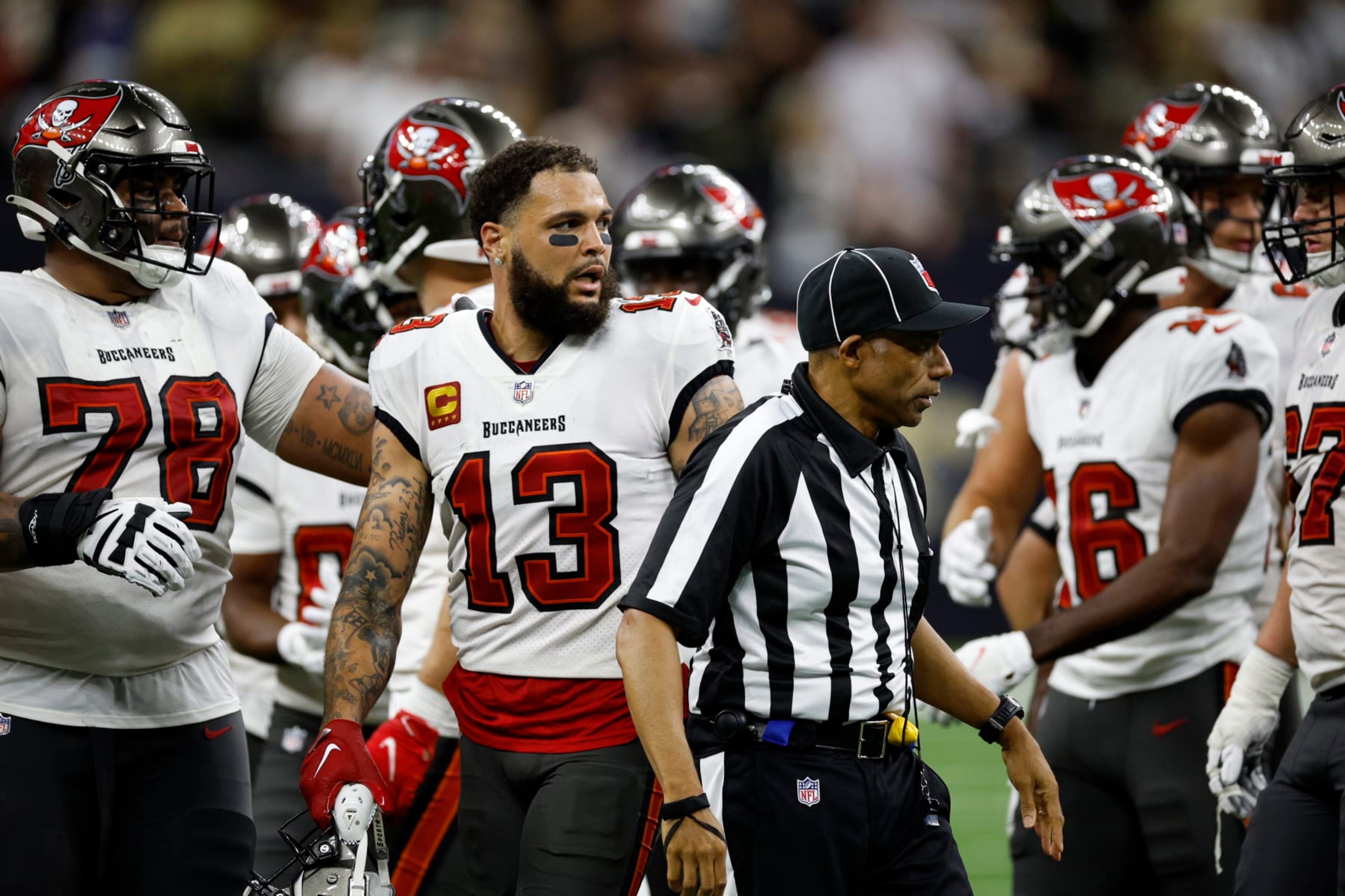 NEW ORLEANS, LOUISIANA - SEPTEMBER 18: Mike Evans #13 of the Tampa Bay Buccaneers looks on after a fight with Marshon Lattimore #23 of the New Orleans Saints at Caesars Superdome on September 18, 2022 in New Orleans, Louisiana. (Photo by Chris Graythen/Getty Images) NEW ORLEANS, LOUISIANA - SEPTEMBER 18: Mike Evans #13 of the Tampa Bay Buccaneers looks on after a fight with Marshon Lattimore #23 of the New Orleans Saints at Caesars Superdome on September 18, 2022 in New Orleans, Louisiana. (Photo by Chris Graythen/Getty Images)