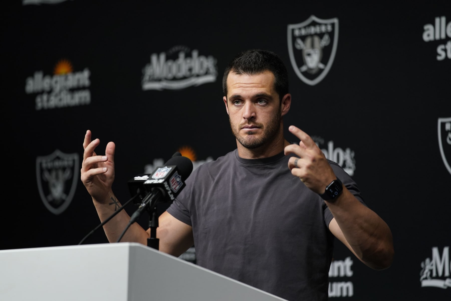 Las Vegas Raiders quarterback Derek Carr answers questions after an NFL football game against the Arizona Cardinals Sunday, Sept. 18, 2022, in Las Vegas. (AP Photo/John Locher)