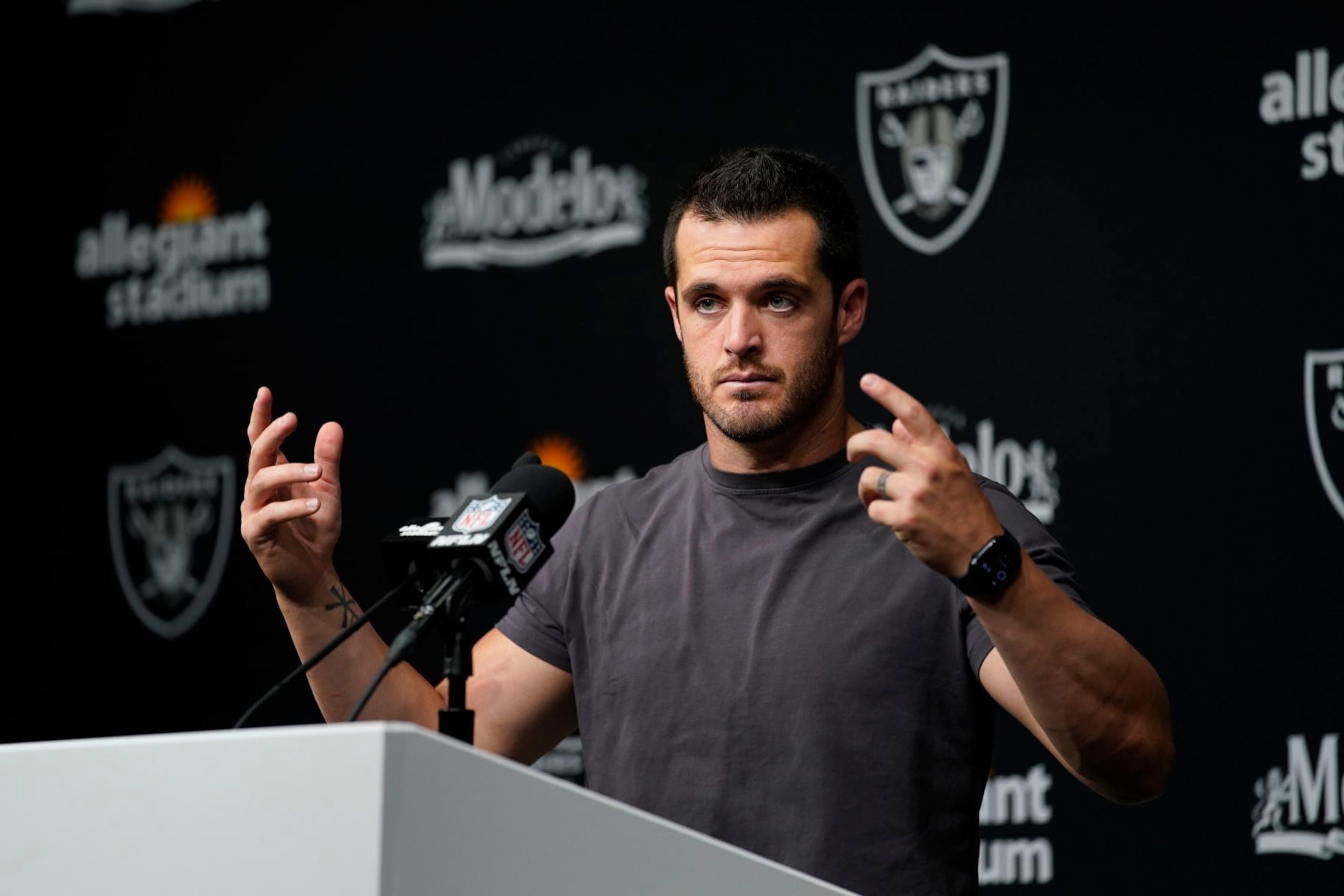 Las Vegas Raiders quarterback Derek Carr answers questions after an NFL football game against the Arizona Cardinals Sunday, Sept. 18, 2022, in Las Vegas. (AP Photo/John Locher)