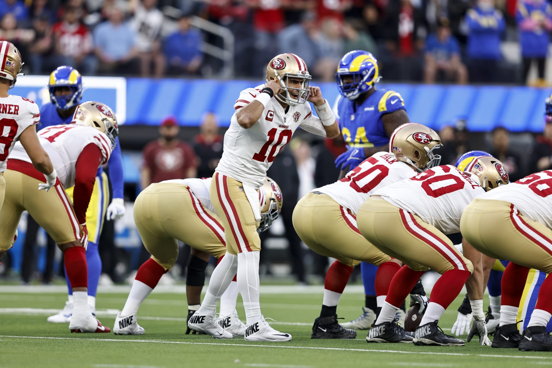 INGLEWOOD, CALIFORNIA - JANUARY 30: Jimmy Garoppolo #10 of the San Francisco 49ers makes a call on the line during the NFC Championship NFL football game against the Los Angeles Rams at SoFi Stadium on January 30, 2022 in Inglewood, California. The Rams won 20-17 to advance to the Super Bowl. (Photo by Michael Owens/Getty Images)