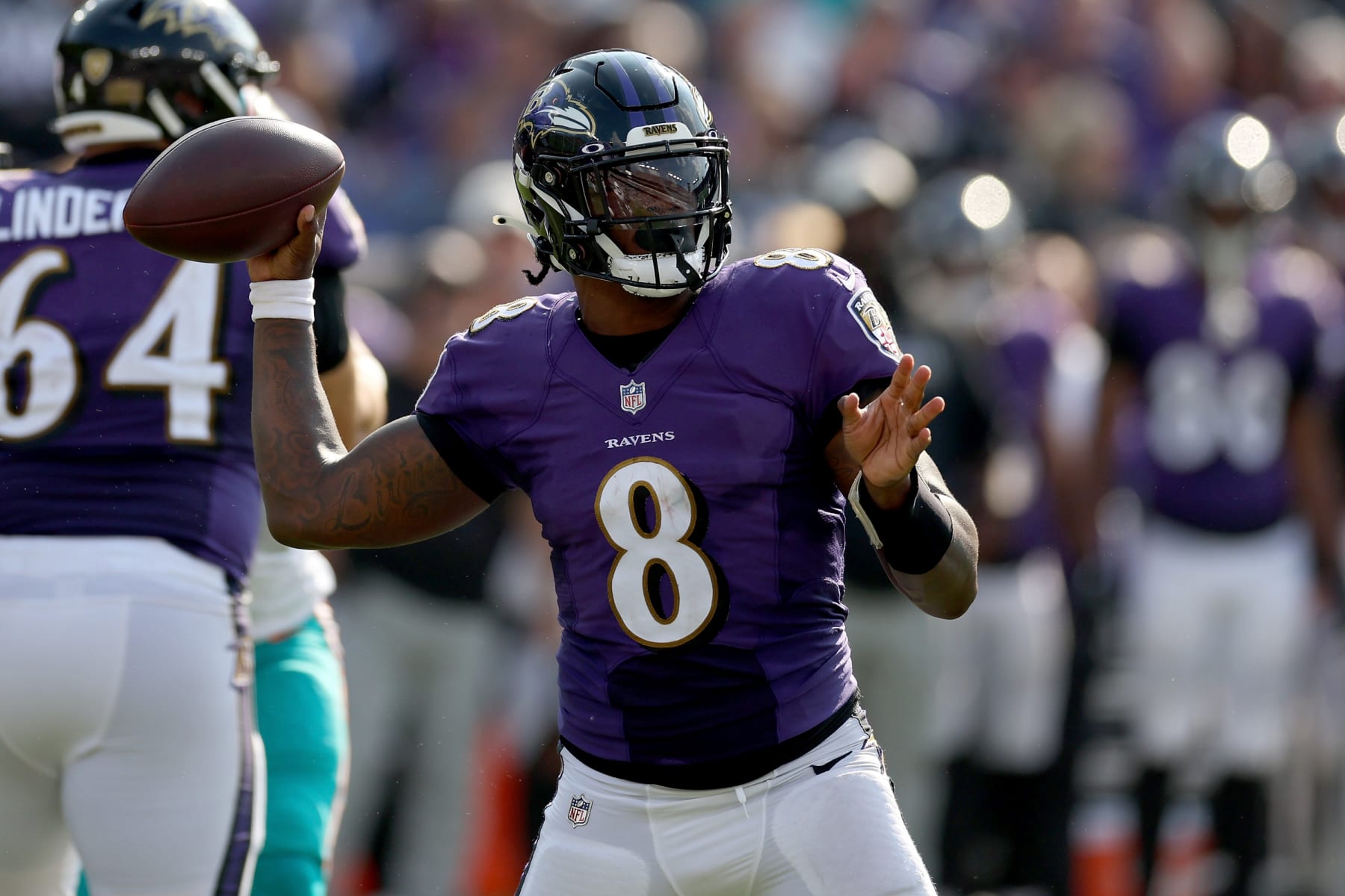 BALTIMORE, MARYLAND - SEPTEMBER 18: Lamar Jackson #8 of the Baltimore Ravens throws a pass in the fourth quarter against the Miami Dolphins at M&T Bank Stadium on September 18, 2022 in Baltimore, Maryland. (Photo by Rob Carr/Getty Images)
