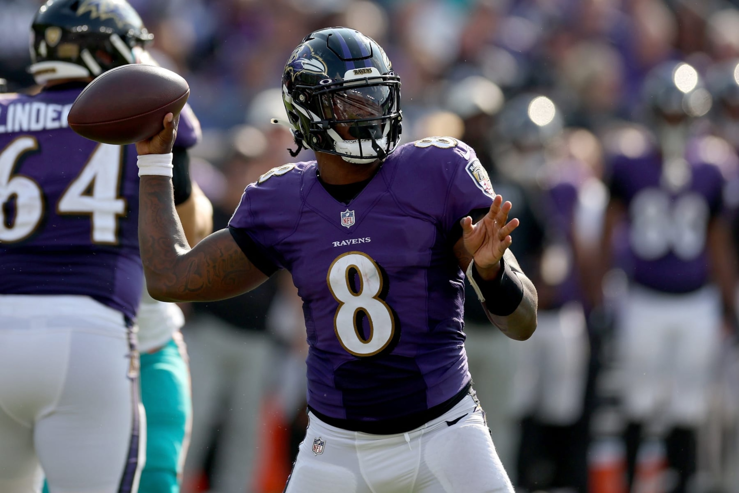 BALTIMORE, MARYLAND - SEPTEMBER 18: Lamar Jackson #8 of the Baltimore Ravens throws a pass in the fourth quarter against the Miami Dolphins at M&T Bank Stadium on September 18, 2022 in Baltimore, Maryland. (Photo by Rob Carr/Getty Images) BALTIMORE, MARYLAND - SEPTEMBER 18: Lamar Jackson #8 of the Baltimore Ravens throws a pass in the fourth quarter against the Miami Dolphins at M&T Bank Stadium on September 18, 2022 in Baltimore, Maryland. (Photo by Rob Carr/Getty Images)