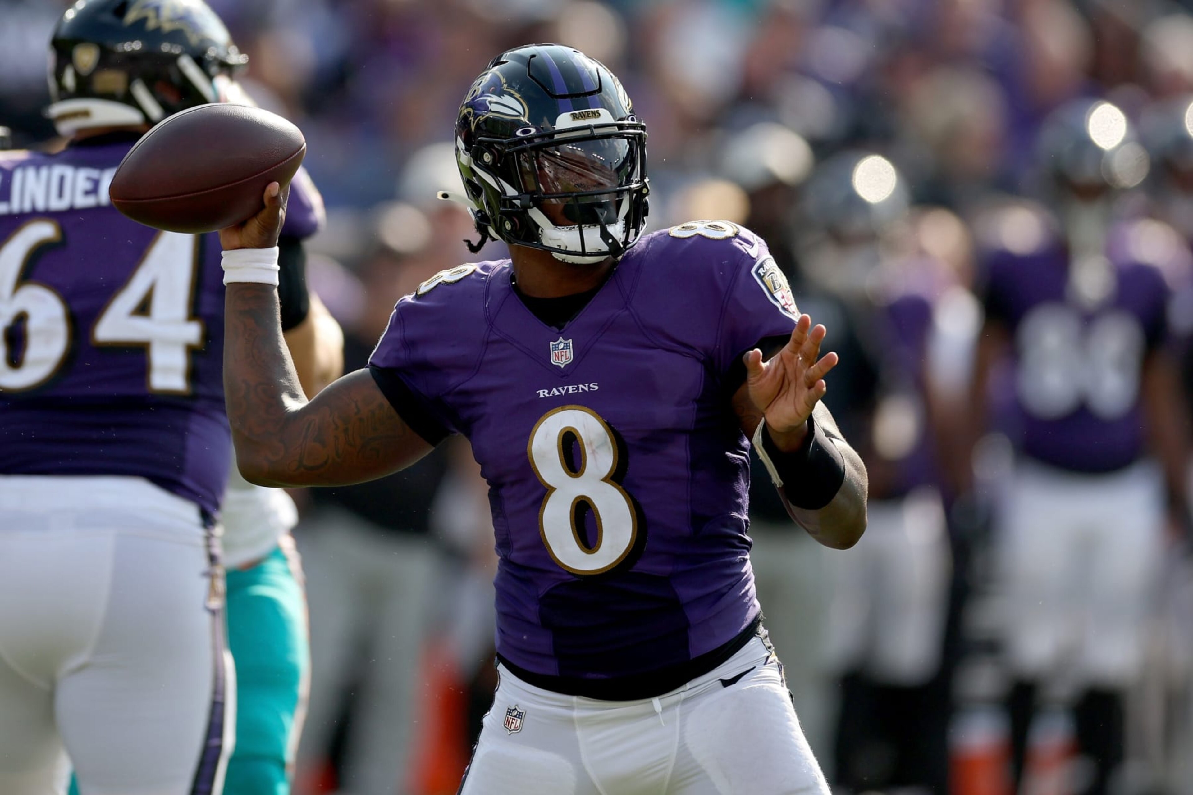 BALTIMORE, MARYLAND - SEPTEMBER 18: Lamar Jackson #8 of the Baltimore Ravens throws a pass in the fourth quarter against the Miami Dolphins at M&T Bank Stadium on September 18, 2022 in Baltimore, Maryland. (Photo by Rob Carr/Getty Images)