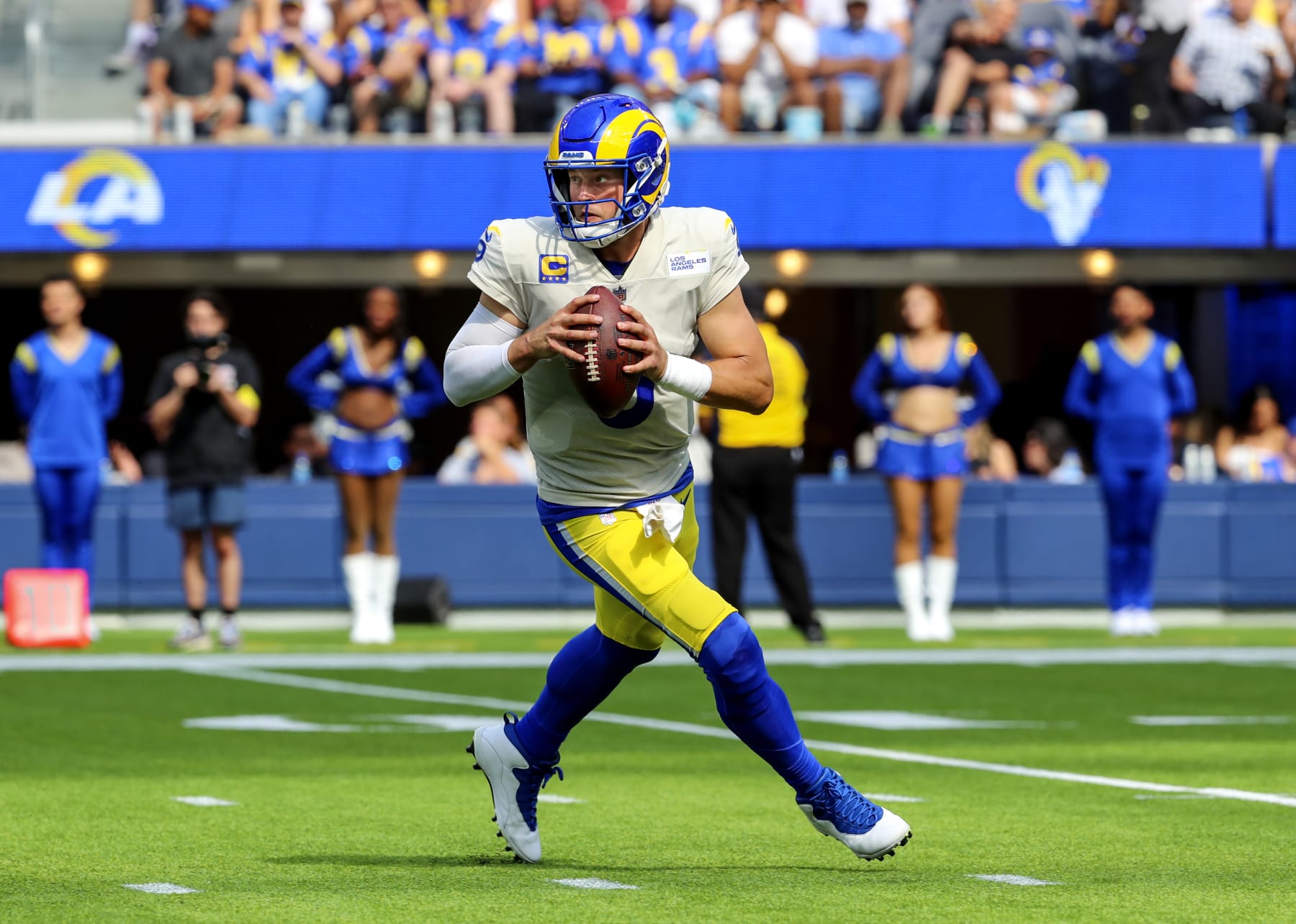 Los Angeles, CA - September 18: Rams quarterback Matthew Stafford rolls out for a pass against the Falcons in the second half at SoFi Stadium in Los Angeles on Sunday, Sept. 18, 2022. (Allen J. Schaben / Los Angeles Times via Getty Images)