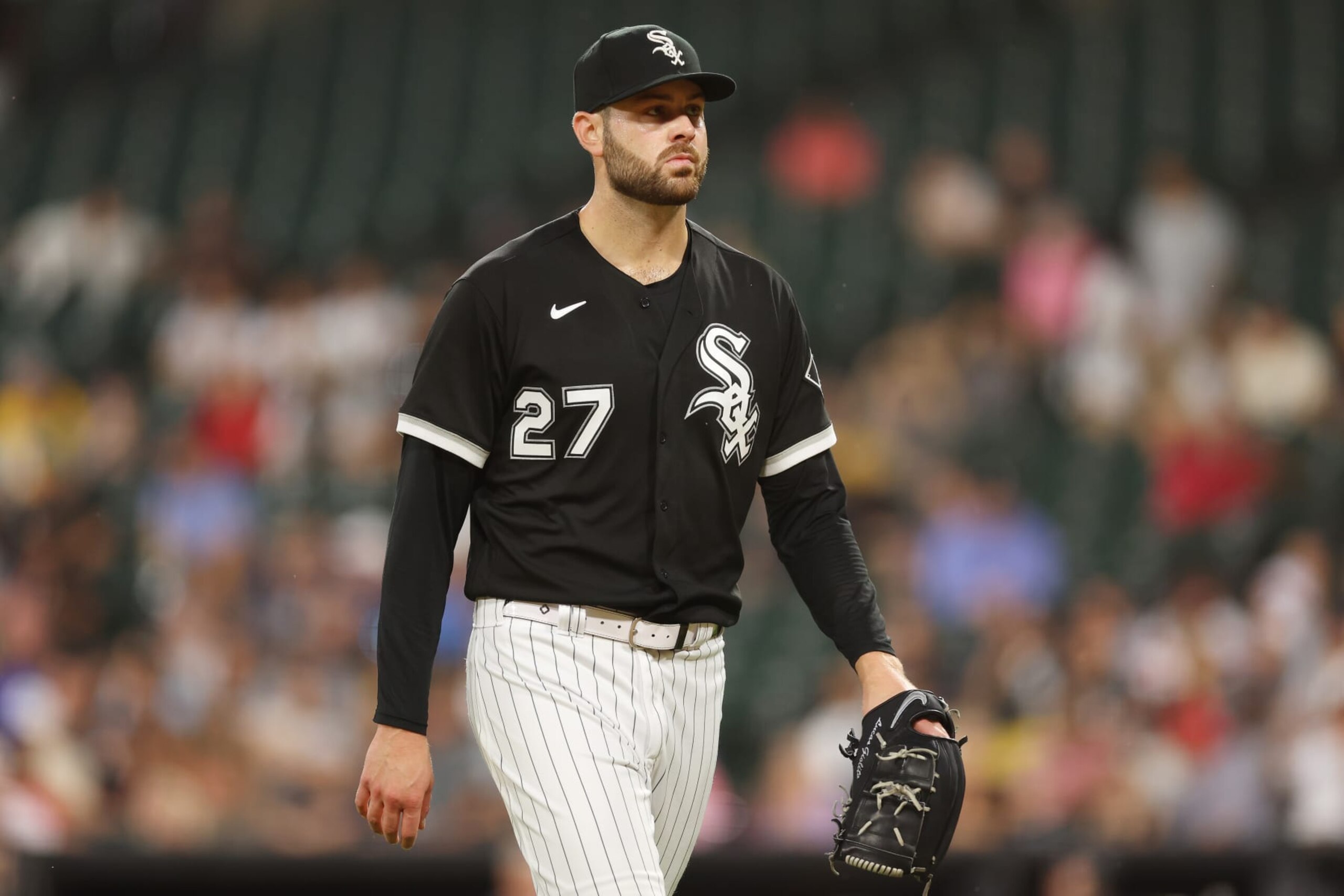CHICAGO, ILLINOIS - AUGUST 30: Lucas Giolito #27 of the Chicago White Sox reacts against the Kansas City Royals during the second inning at Guaranteed Rate Field on August 30, 2022 in Chicago, Illinois. (Photo by Michael Reaves/Getty Images)