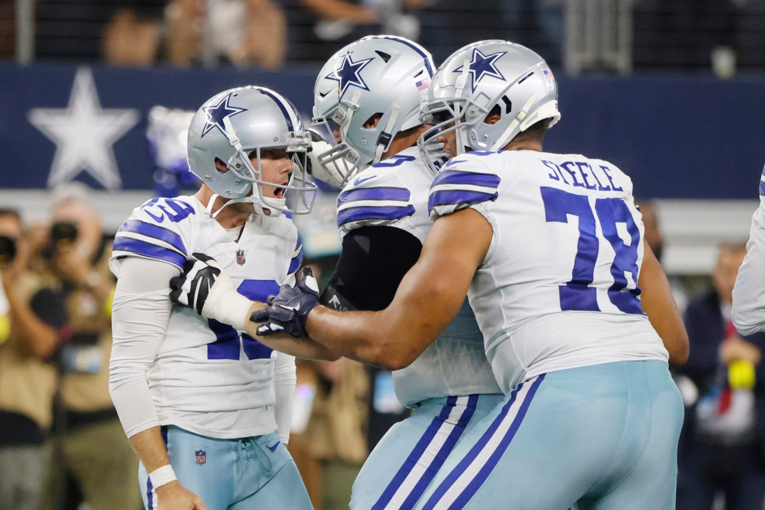 Dallas Cowboys place kicker Brett Maher (19) celebrates his game winning field goal during the second half of an NFL football game against the Cincinnati Bengals Sunday, Sept. 18, 2022, in Arlington, Tx. (AP Photo/Michael Ainsworth)