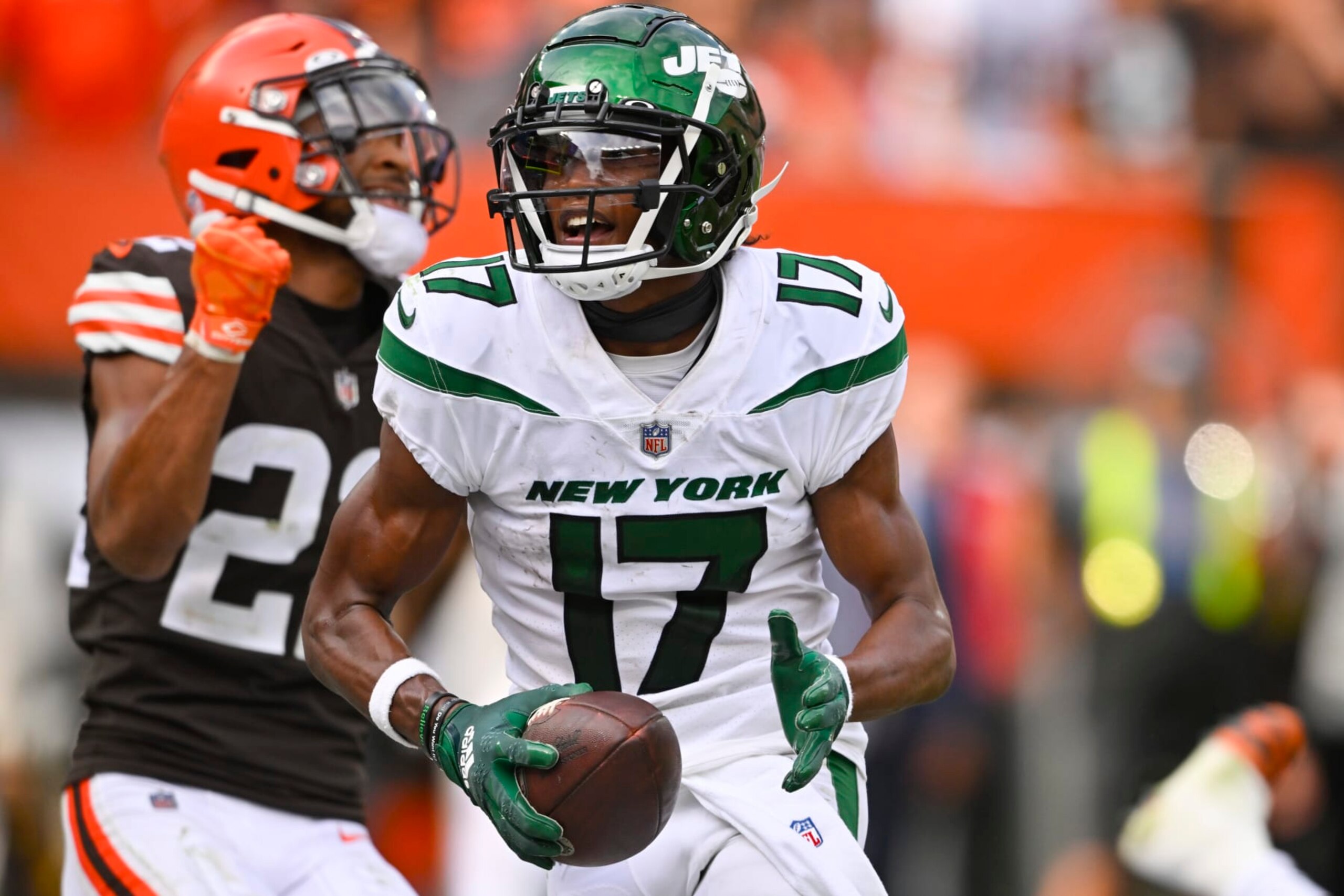 New York Jets wide receiver Garrett Wilson (17) celebrates past Cleveland Browns safety Grant Delpit (22) after scoring a touchdown during the second half of an NFL football game, Sunday, Sept. 18, 2022, in Cleveland. (AP Photo/David Richard) New York Jets wide receiver Garrett Wilson (17) celebrates past Cleveland Browns safety Grant Delpit (22) after scoring a touchdown during the second half of an NFL football game, Sunday, Sept. 18, 2022, in Cleveland. (AP Photo/David Richard)