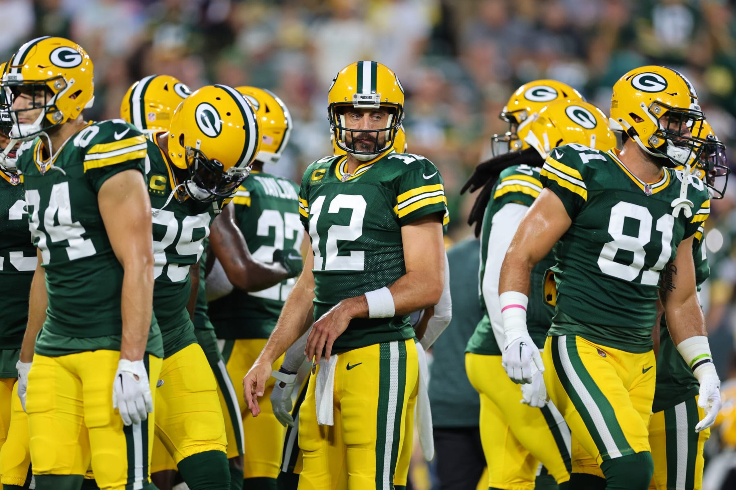 GREEN BAY, WISCONSIN - SEPTEMBER 18: Aaron Rodgers #12 of the Green Bay Packers warms up before the game against the Chicago Bears at Lambeau Field on September 18, 2022 in Green Bay, Wisconsin. (Photo by Michael Reaves/Getty Images)