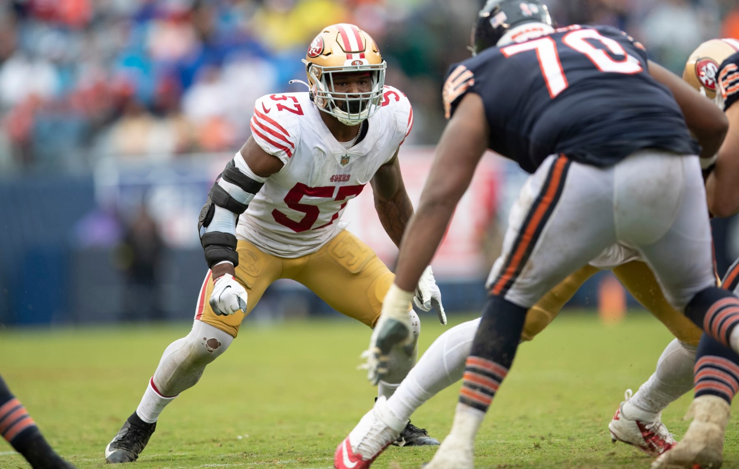 CHICAGO, IL - SEPTEMBER 11: Dre Greenlaw #57 of the San Francisco 49ers defends during the game against the Chicago Bears at Soldier Field on September 11, 2022 in Chicago, Illinois. The Bears defeated the 49ers 19-10. (Photo by Michael Zagaris/San Francisco 49ers/Getty Images)