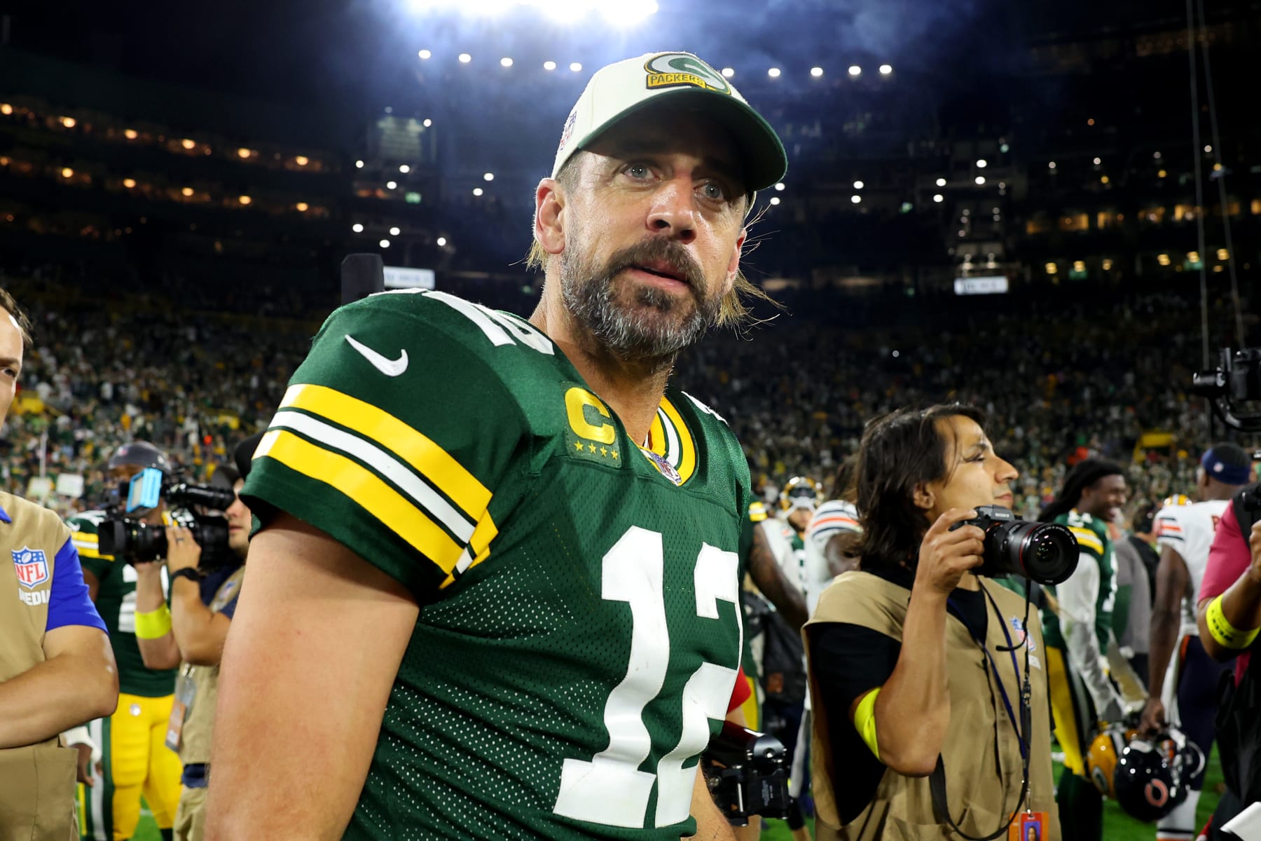 GREEN BAY, WISCONSIN - SEPTEMBER 18: Aaron Rodgers #12 of the Green Bay Packers looks on after a win over the Chicago Bears at Lambeau Field on September 18, 2022 in Green Bay, Wisconsin. (Photo by Michael Reaves/Getty Images)