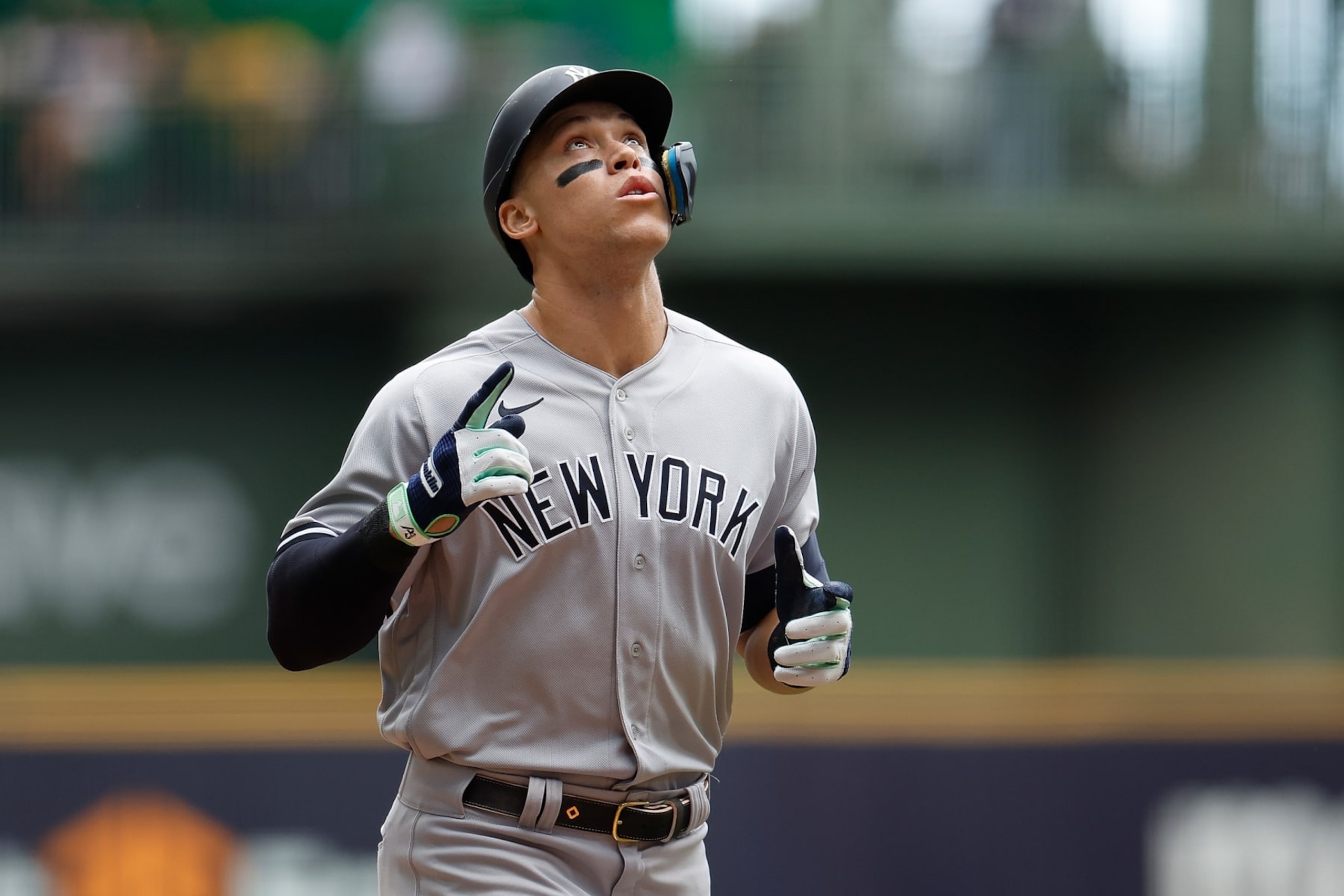 MILWAUKEE, WISCONSIN - SEPTEMBER 18: Aaron Judge #99 of the New York Yankees crosses home plate after hitting a home run in the third inning against the Milwaukee Brewers at American Family Field on September 18, 2022 in Milwaukee, Wisconsin. (Photo by John Fisher/Getty Images)