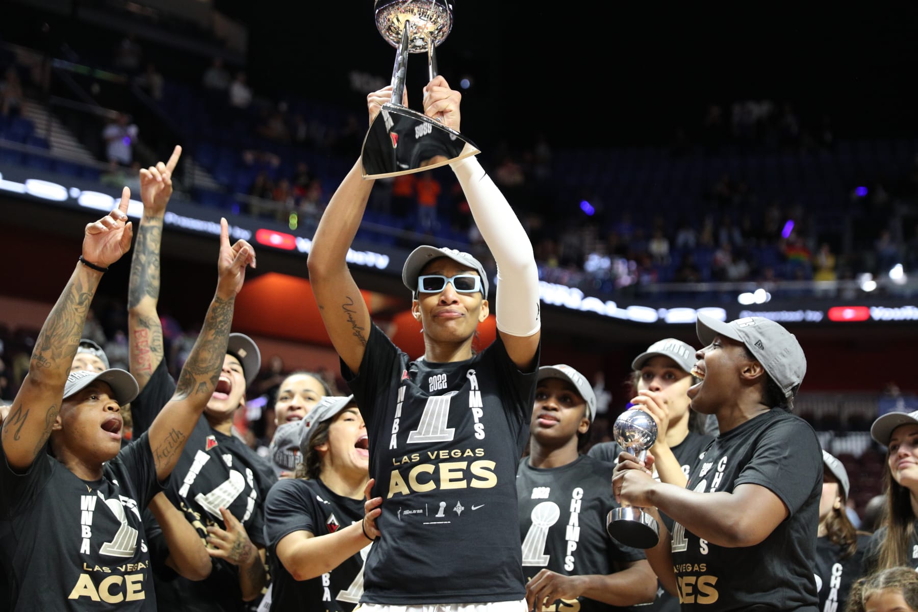 UNCASVILLE, CT - SEPTEMBER 18: A'ja Wilson #22 of the Las Vegas Aces holds up the 2022 WNBA Championship Trophy after Game 4 of the 2022 WNBA Finals on September 18, 2022 at Mohegan Sun Arena in Uncasville, Connecticut.  NOTE TO USER: User expressly acknowledges and agrees that, by downloading and/or using this Photograph, user is consenting to the terms and conditions of the Getty Images License Agreement. Mandatory Copyright Notice: Copyright 2022 NBAE (Photo by Chris Marion/NBAE via Getty Images)