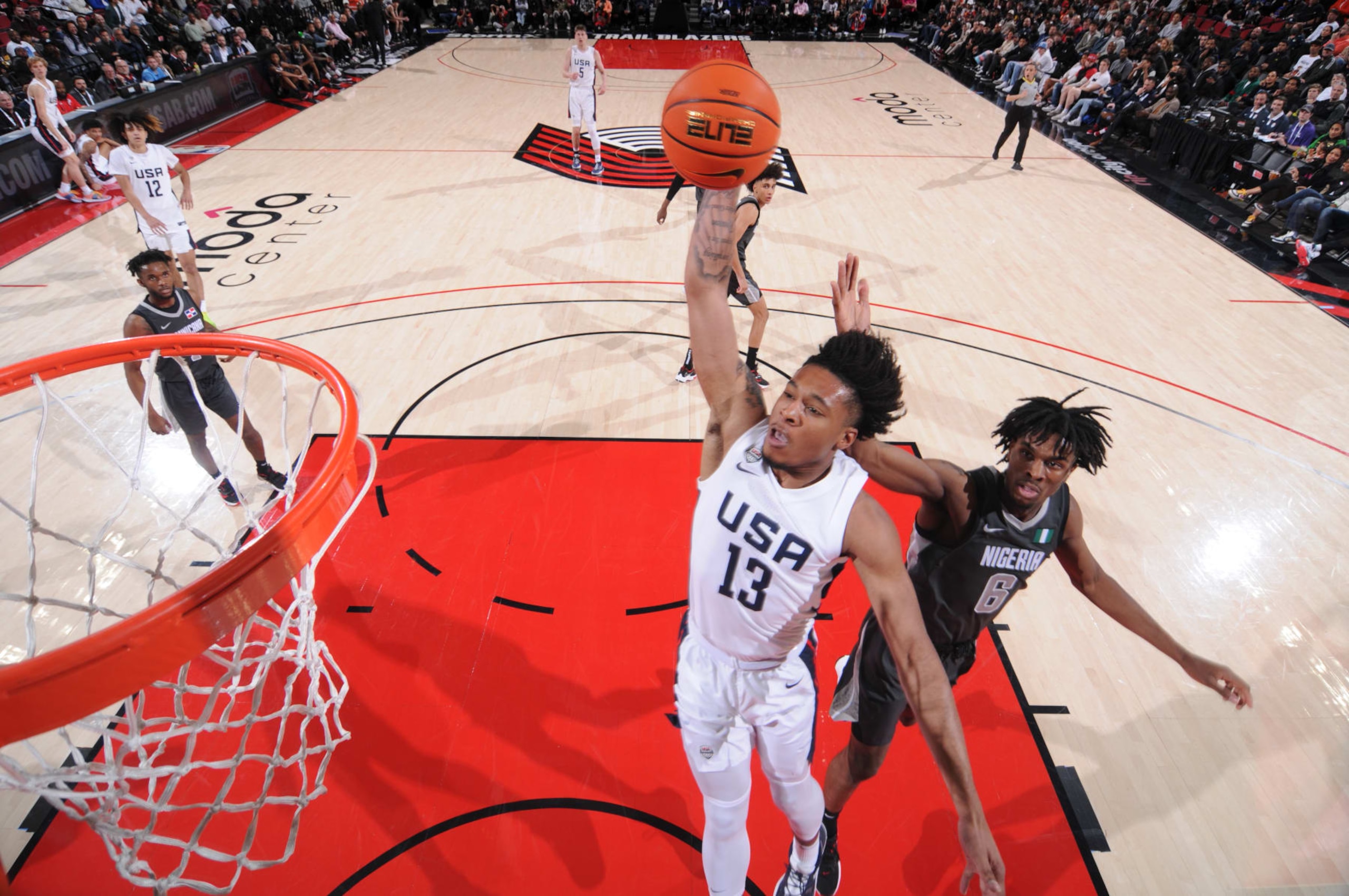 PORTLAND, OR - APRIL 8: Cam Whitmore #13 of Team USA dunks the ball against Team World during the 2022 Nike Hoop Summit on April 8, 2022 at the Moda Center Arena in Portland, Oregon. NOTE TO USER: User expressly acknowledges and agrees that, by downloading and or using this photograph, user is consenting to the terms and conditions of the Getty Images License Agreement. Mandatory Copyright Notice: Copyright 2022 NBAE (Photo by Sam Forencich/NBAE via Getty Images)