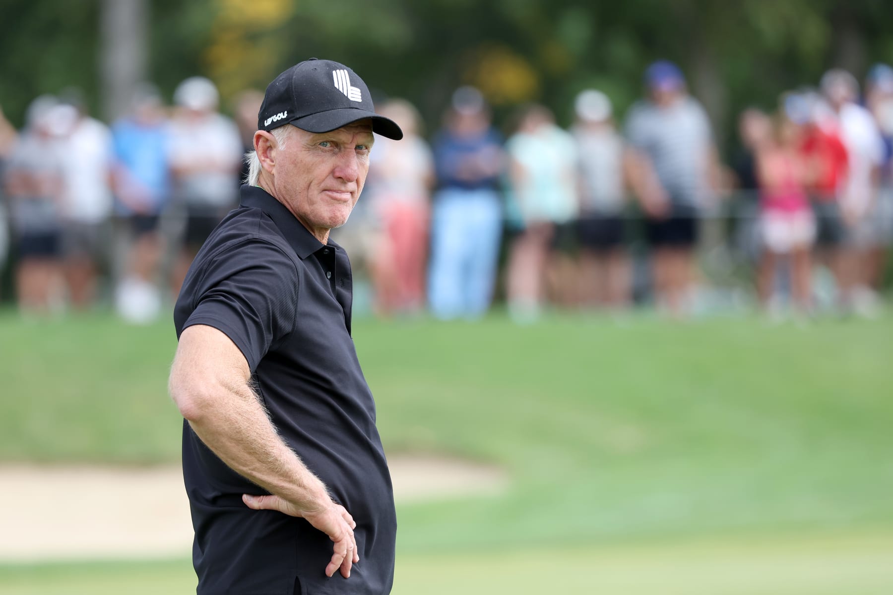 SUGAR GROVE, ILLINOIS - SEPTEMBER 18: Greg Norman, CEO and commissioner of LIV Golf, looks on from the second fairway during Day Three of the LIV Golf Invitational - Chicago at Rich Harvest Farms on September 18, 2022 in Sugar Grove, Illinois. (Photo by Jonathan Ferrey/LIV Golf via Getty Images)