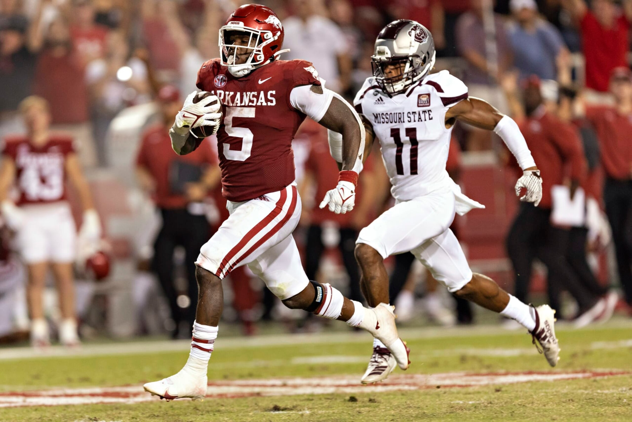 FAYETTEVILLE, ARKANSAS - SEPTEMBER 17: Raheim Sanders #5 of the Arkansas Razorbacks runs the ball in for a touchdown in the second half of game against the Missouri State Bears at Donald W. Reynolds Razorback Stadium on September 17, 2022 in Fayetteville, Arkansas. The Razorbacks defeated the Bears 38-27. (Photo by Wesley Hitt/Getty Images) FAYETTEVILLE, ARKANSAS - SEPTEMBER 17: Raheim Sanders #5 of the Arkansas Razorbacks runs the ball in for a touchdown in the second half of game against the Missouri State Bears at Donald W. Reynolds Razorback Stadium on September 17, 2022 in Fayetteville, Arkansas. The Razorbacks defeated the Bears 38-27. (Photo by Wesley Hitt/Getty Images)