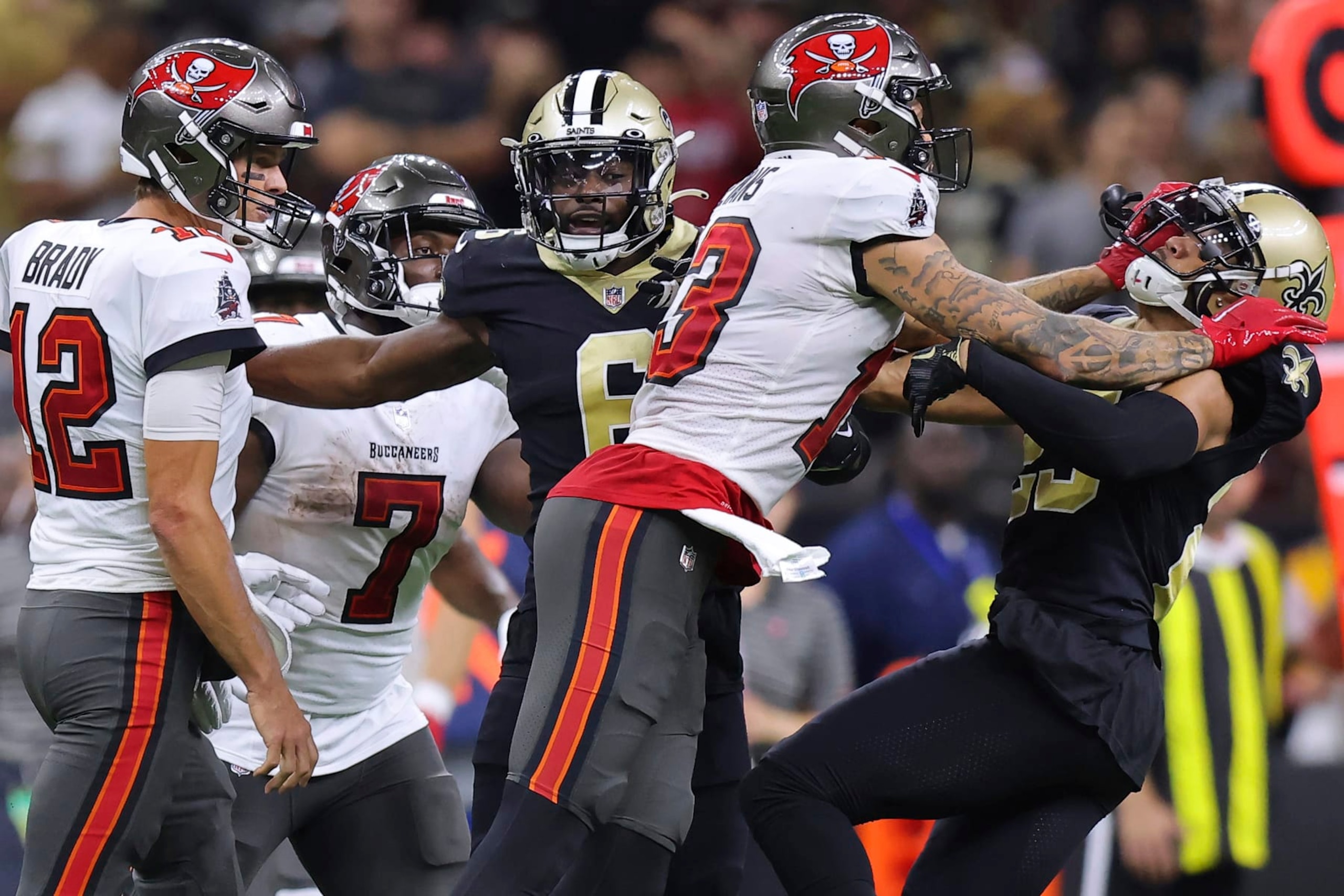 Tampa Bay Buccaneers wide receiver Mike Evans (13) and New Orleans Saints cornerback Marshon Lattimore (23) get into an altercation during the second half of an NFL football game, Sunday, Sept. 18, 2021, in New Orleans. (AP Photo/Jonathan Bachman)