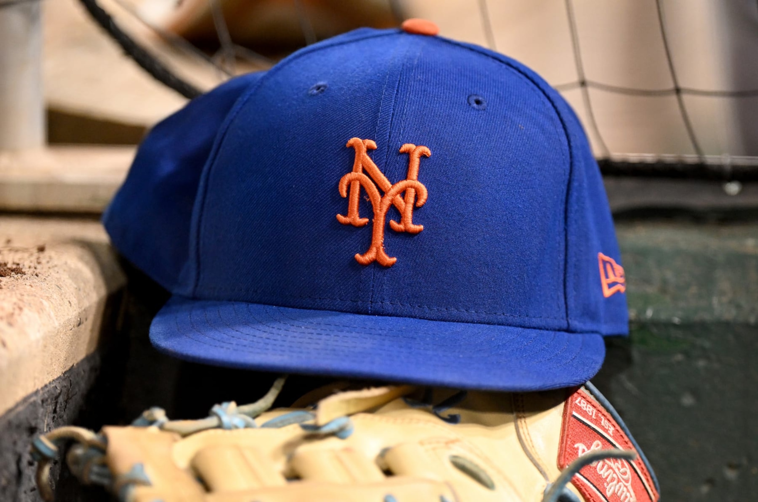 WASHINGTON, DC - AUGUST 02: A view of a New York Mets baseball cap on the stairs of the dugout during the game against the Washington Nationals at Nationals Park on August 02, 2022 in Washington, DC. (Photo by G Fiume/Getty Images)