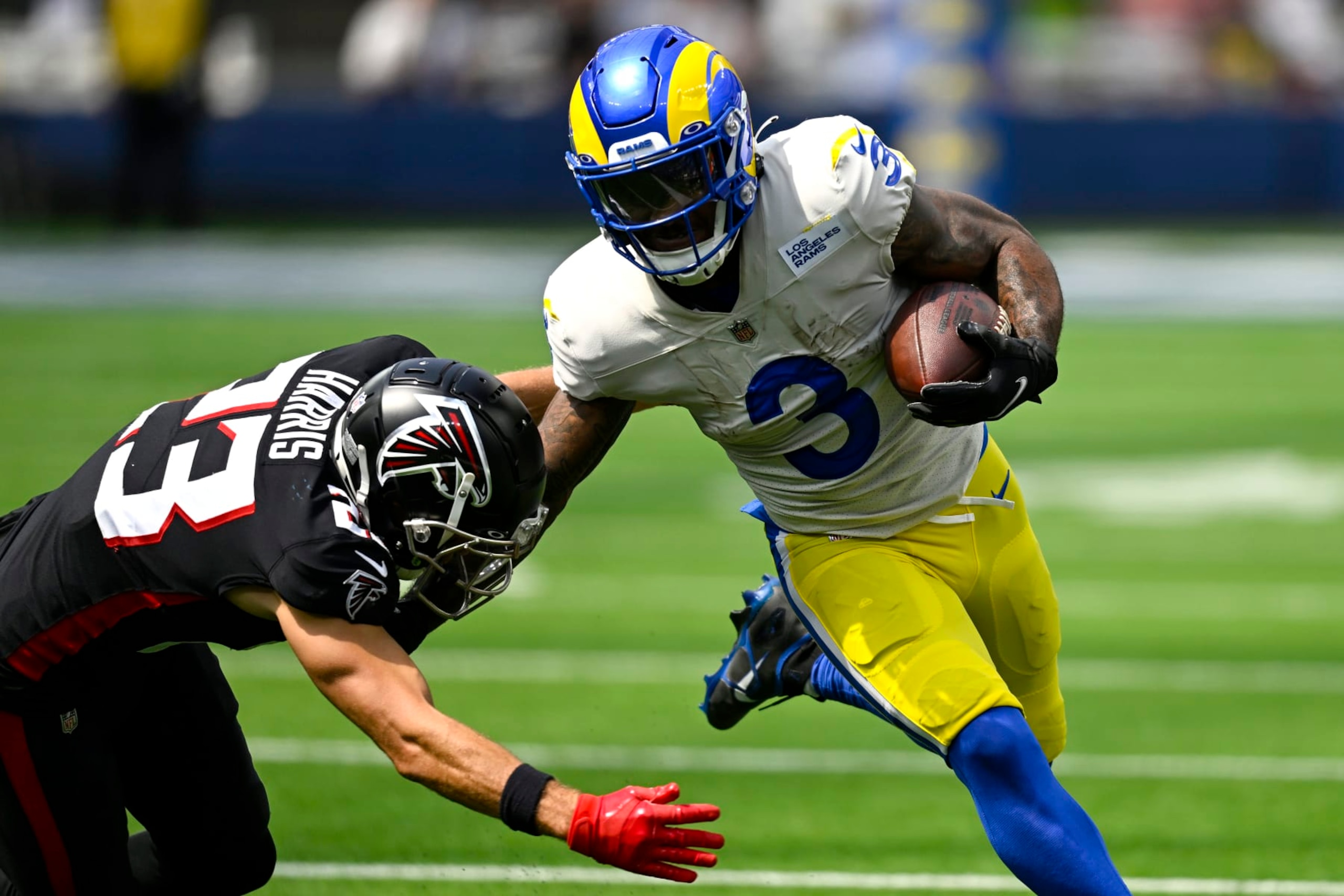 INGLEWOOD, CALIFORNIA - SEPTEMBER 18: Cam Akers #3 of the Los Angeles Rams carries the ball past Nick Kwiatkoski #53 of the Atlanta Falcons during the second quarter at SoFi Stadium on September 18, 2022 in Inglewood, California. (Photo by John McCoy/Getty Images) INGLEWOOD, CALIFORNIA - SEPTEMBER 18: Cam Akers #3 of the Los Angeles Rams carries the ball past Nick Kwiatkoski #53 of the Atlanta Falcons during the second quarter at SoFi Stadium on September 18, 2022 in Inglewood, California. (Photo by John McCoy/Getty Images)
