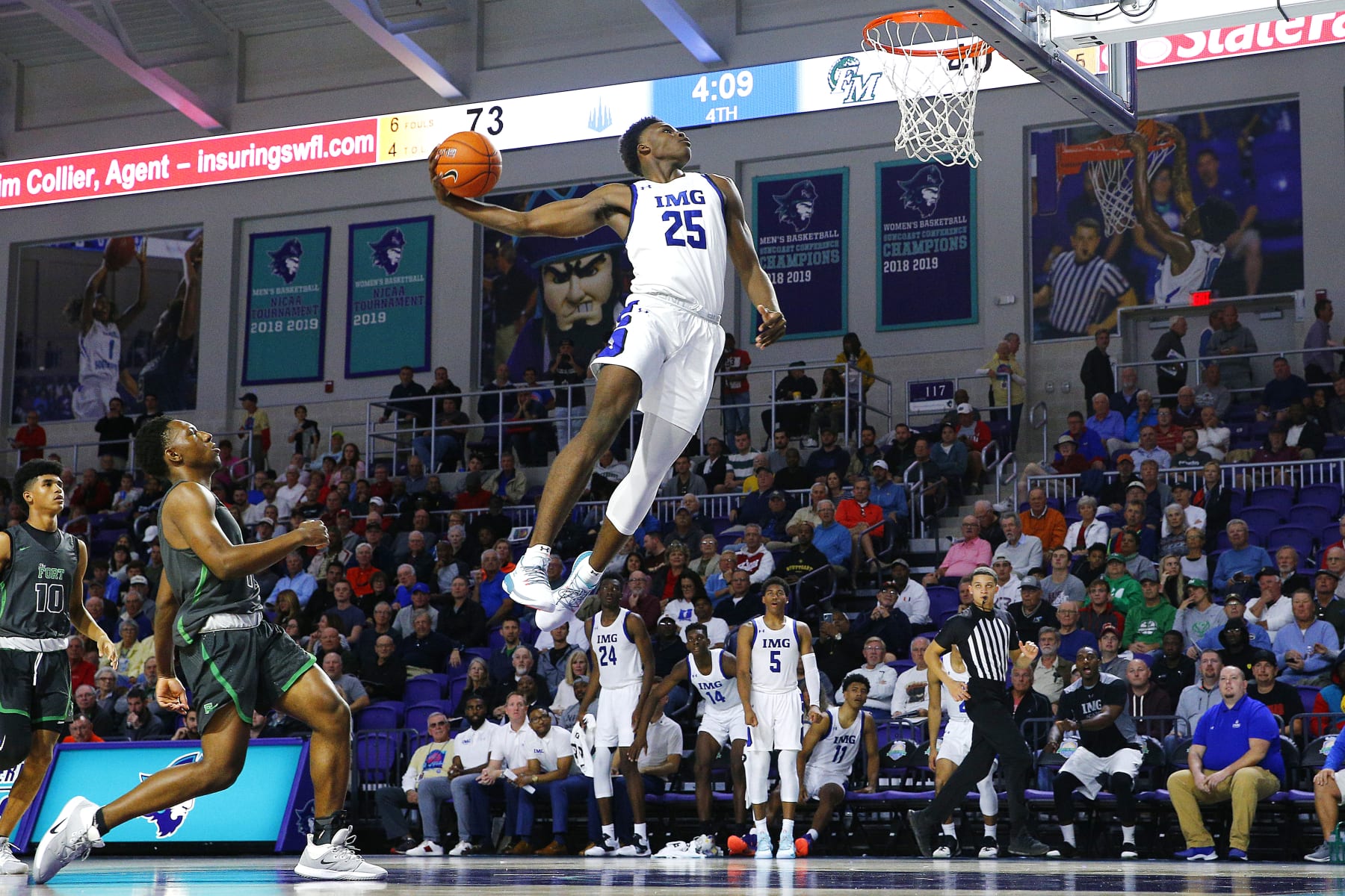 FORT MYERS, FLORIDA - DECEMBER 19:  Jarace Walker #25 of IMG Academy goes up for a dunk against Fort Myers High School during the City of Palms Classic Day 2 at Suncoast Credit Union Arena on December 19, 2019 in Fort Myers, Florida. (Photo by Michael Reaves/Getty Images)
