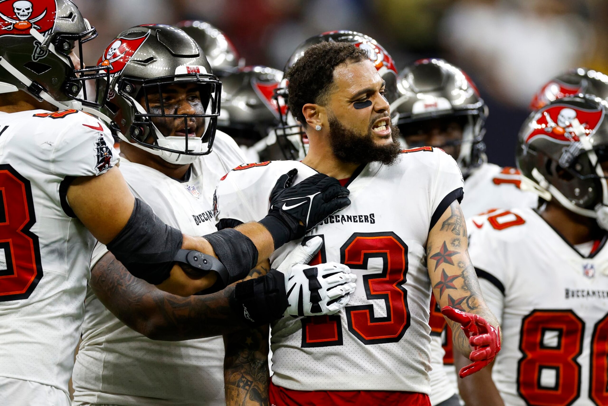 NEW ORLEANS, LOUISIANA - SEPTEMBER 18: Marcus Maye #6 of the New Orleans Saints argues with Mike Evans #13 of the Tampa Bay Buccaneers on the field during the second half of the game at Caesars Superdome on September 18, 2022 in New Orleans, Louisiana. (Photo by Chris Graythen/Getty Images) NEW ORLEANS, LOUISIANA - SEPTEMBER 18: Marcus Maye #6 of the New Orleans Saints argues with Mike Evans #13 of the Tampa Bay Buccaneers on the field during the second half of the game at Caesars Superdome on September 18, 2022 in New Orleans, Louisiana. (Photo by Chris Graythen/Getty Images)