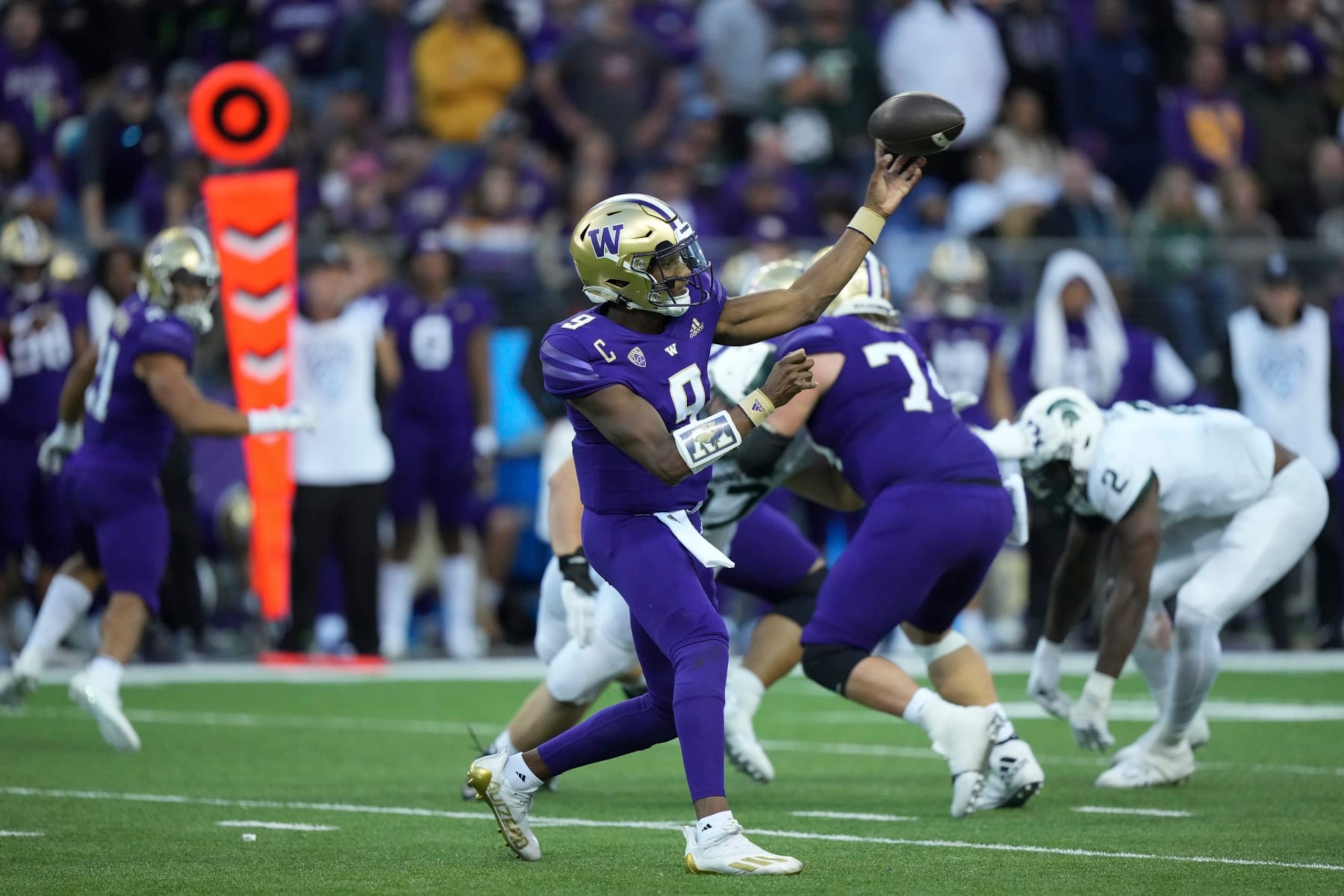 SEATTLE, WA - SEPTEMBER 17: Washington Huskies quarterback Michael Penix Jr. (9) throws from the pocket during a college non-conference football game between the Michigan State Spartans and the Washington Huskies on September 17, 2022 at Husky Stadium in Seattle, WA. (Photo by Jeff Halstead/Icon Sportswire via Getty Images)